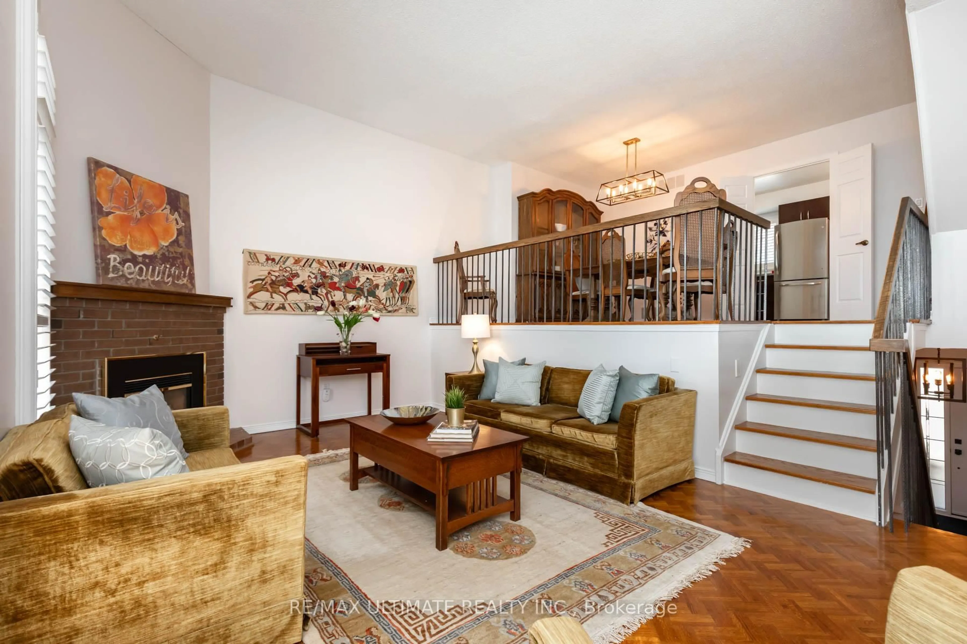 Living room with furniture, wood/laminate floor for 7 Sylvan Valleyway, Toronto Ontario M5M 4M4