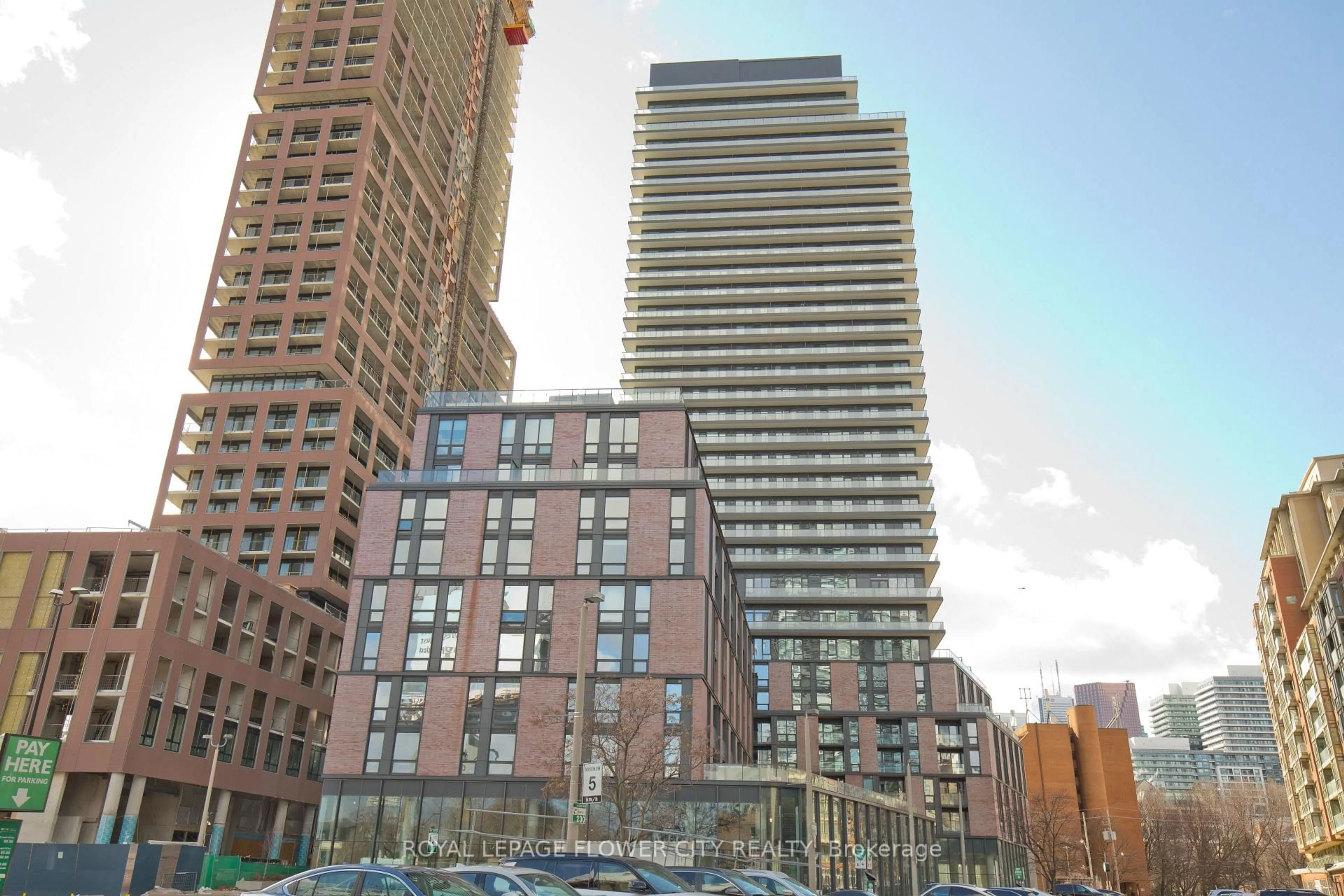Patio, city buildings view from balcony for 35 Parliament St #2308, Toronto Ontario M5A 0Z5