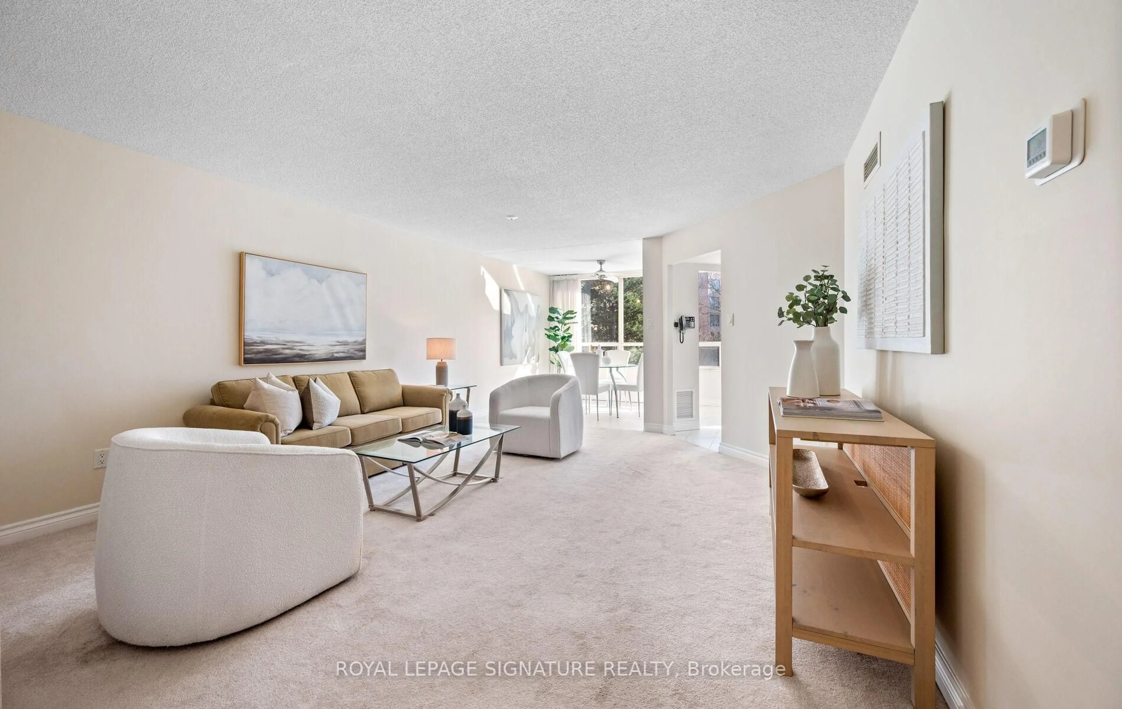 Living room with furniture, ceramic/tile floor for 1210 Don Mills Rd #324, Toronto Ontario M3B 3N9