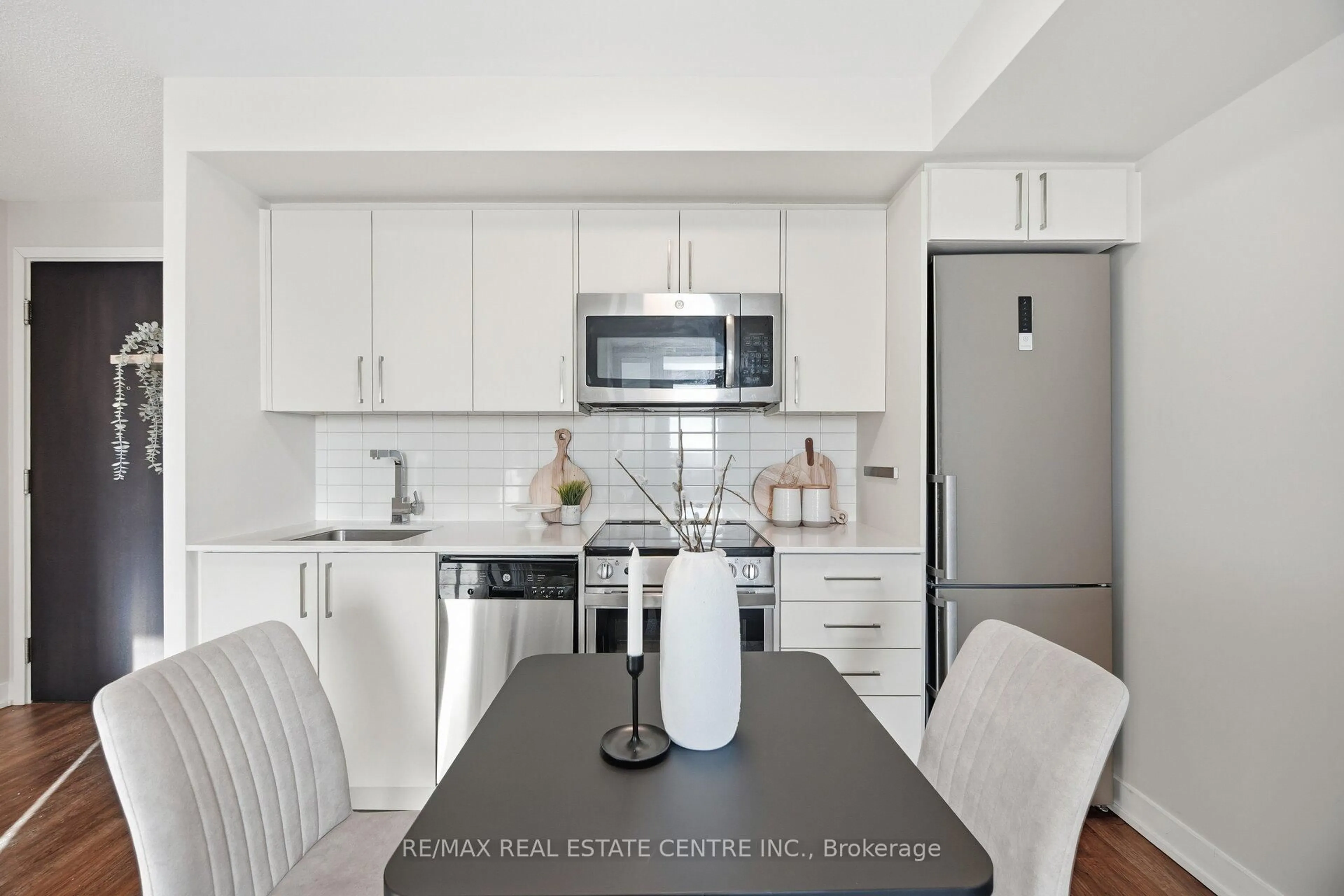 Open concept kitchen, unknown for 38 Monte Kwinter Crt #1112, Toronto Ontario M3H 0E2