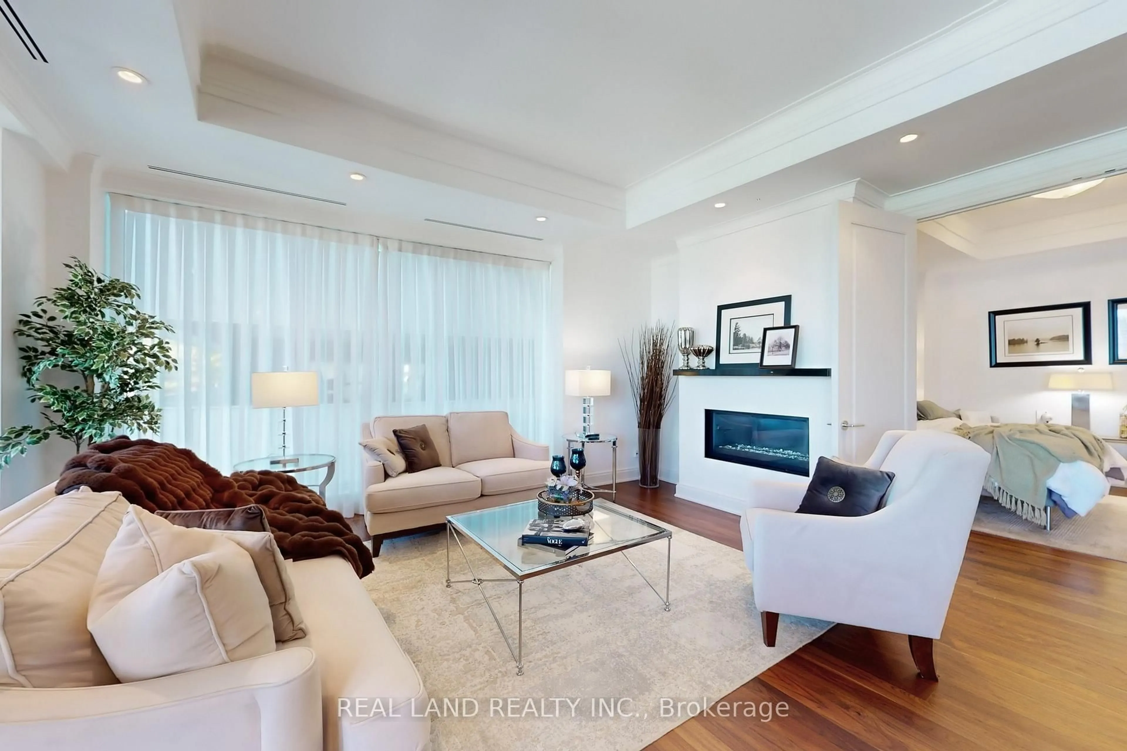 Living room with furniture, wood/laminate floor for 206 Bloor St #1001, Toronto Ontario M5S 1T8