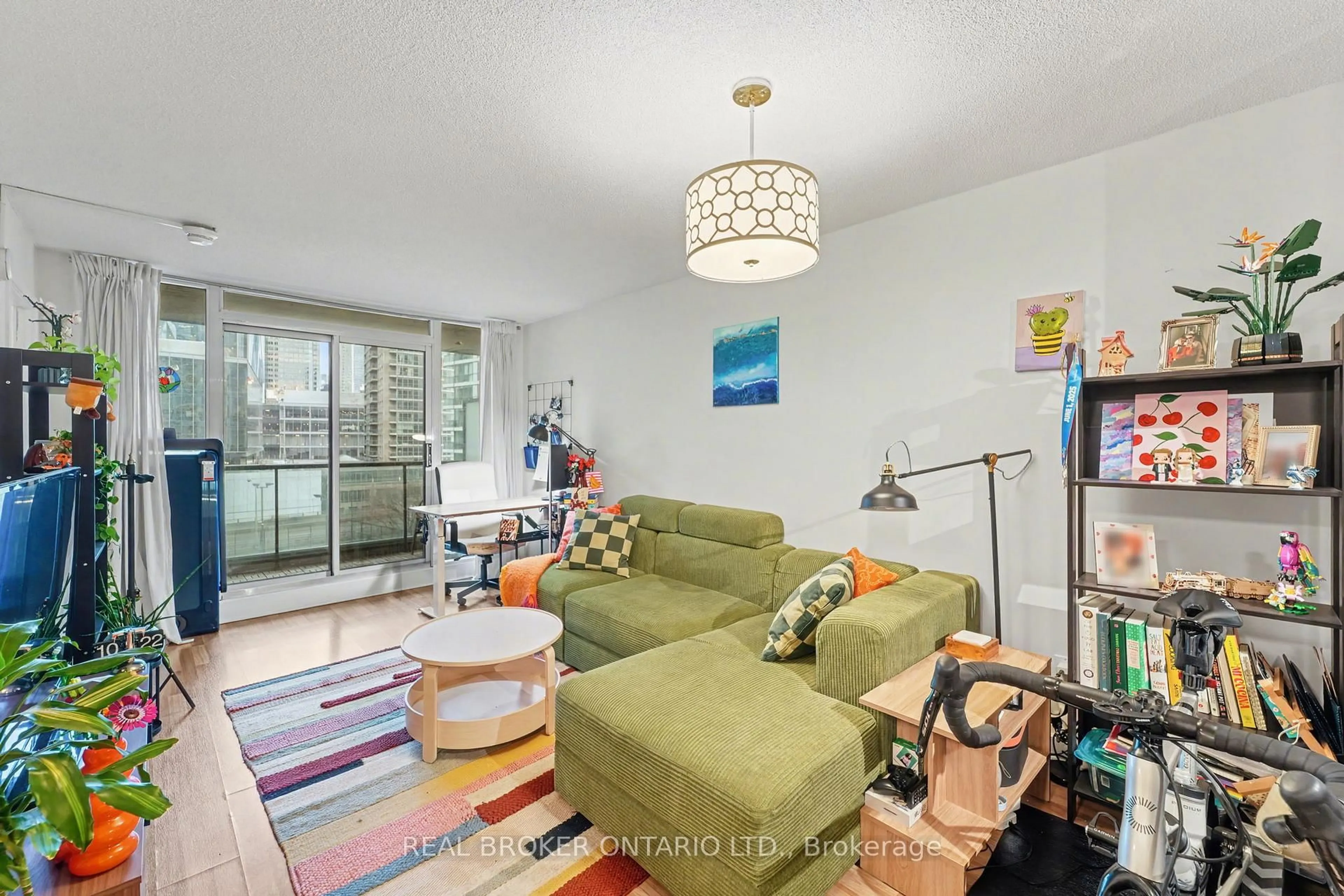 Living room with furniture, unknown for 12 Yonge St #911, Toronto Ontario M5E 1Z9