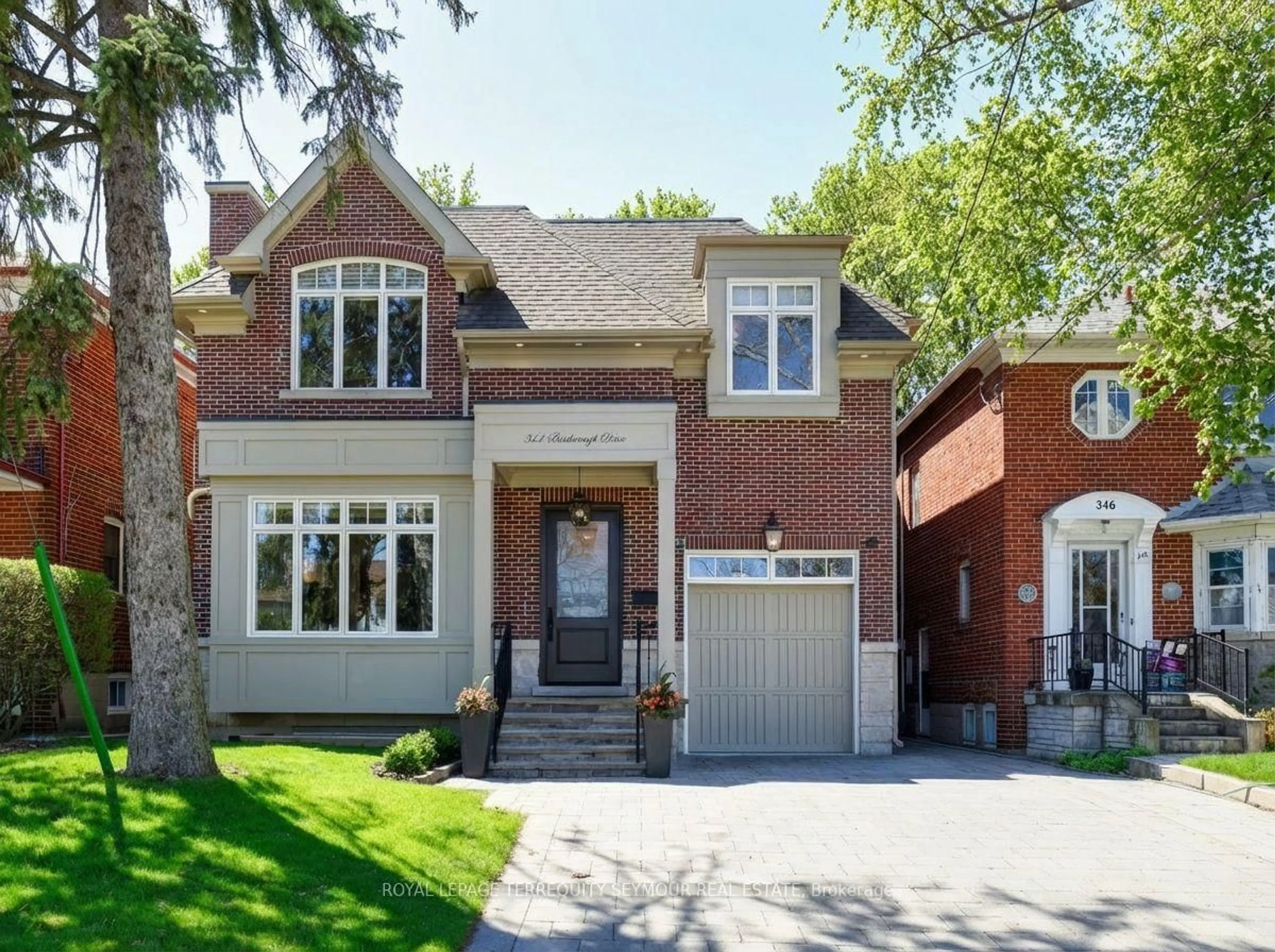 Home with brick exterior material, street for 344 Bessborough Dr, Toronto Ontario M4G 3L2