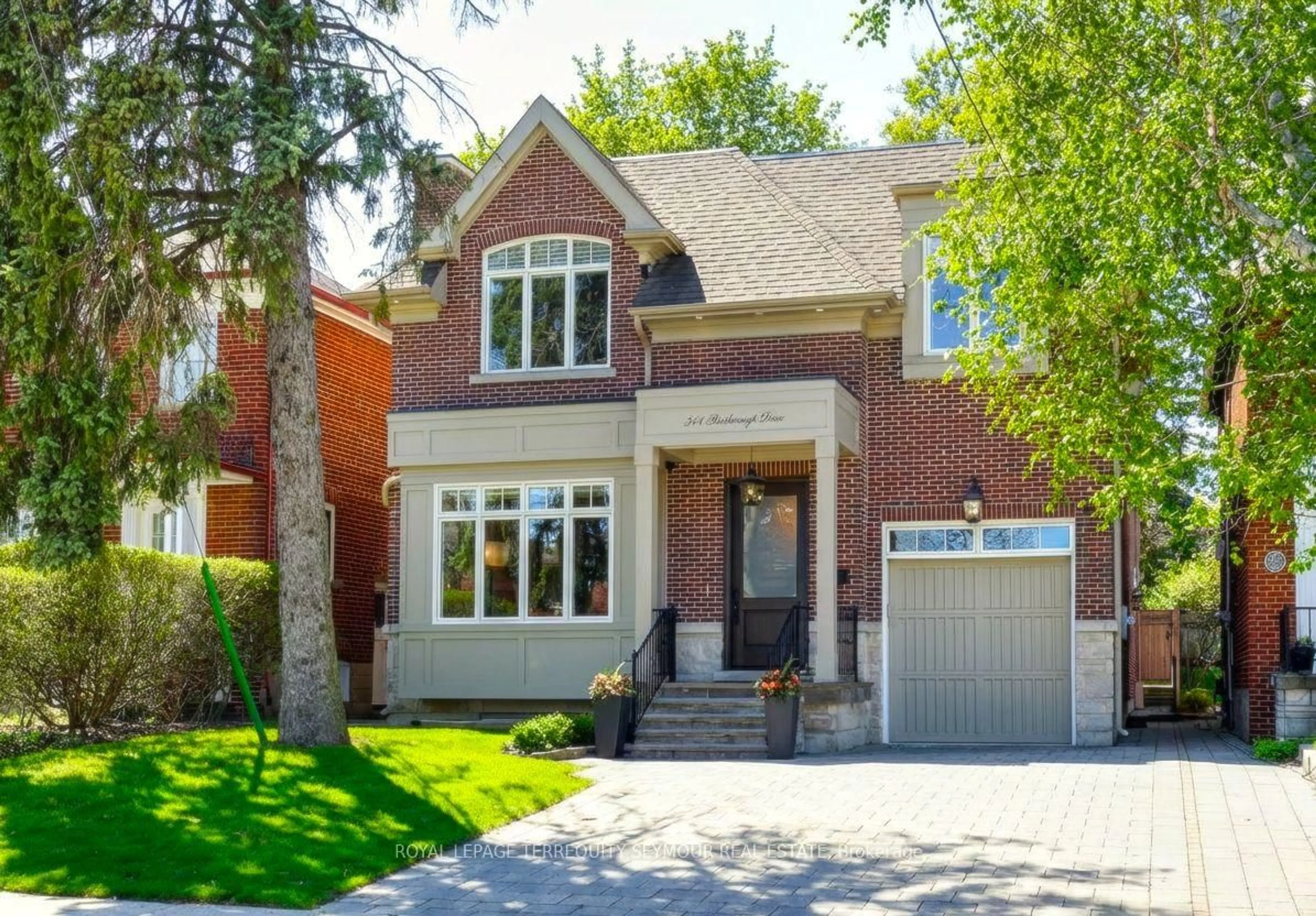 Home with brick exterior material, street for 344 Bessborough Dr, Toronto Ontario M4G 3L2