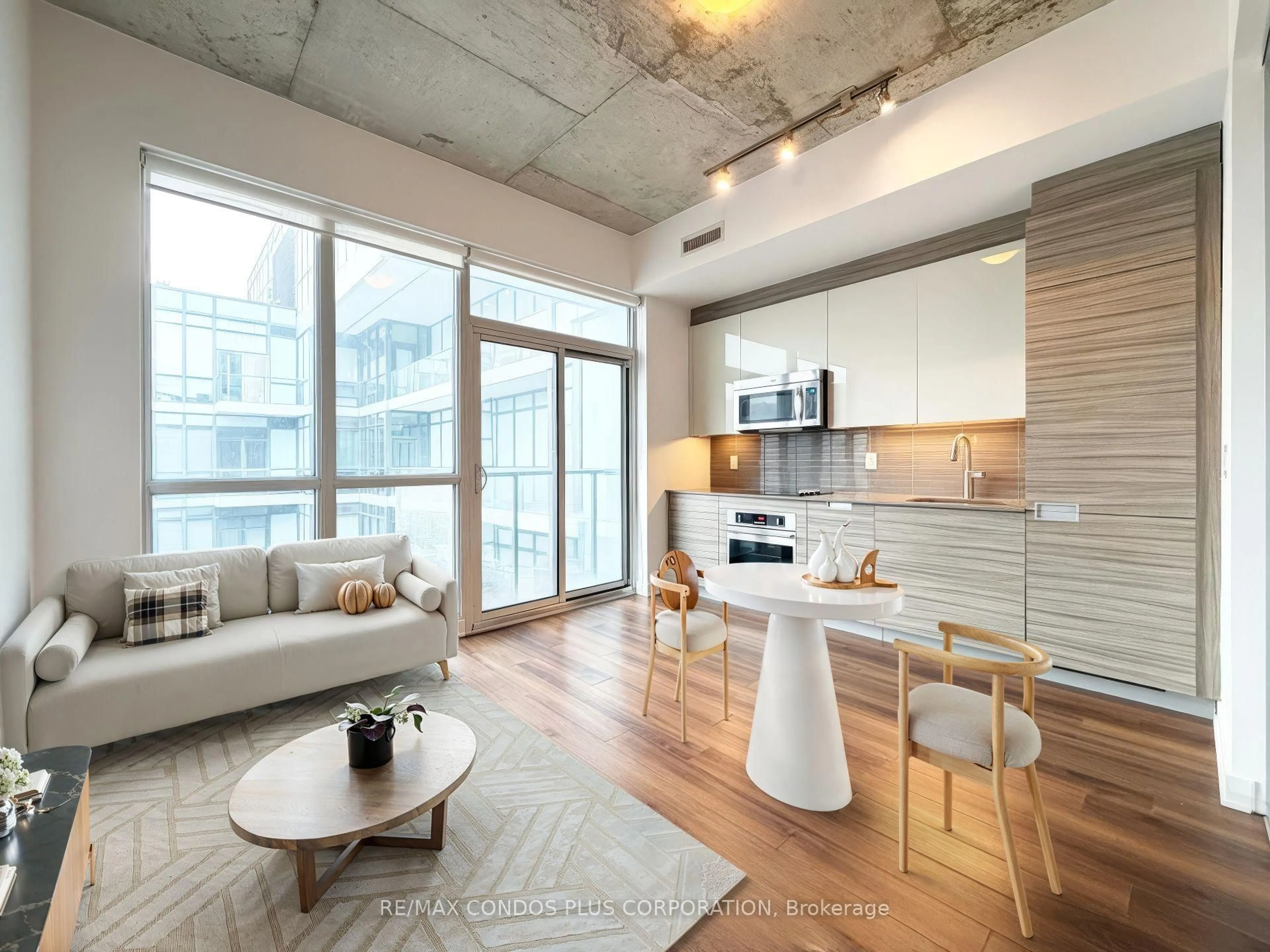 Open concept kitchen, cement floor for 210 Simcoe St #2410, Toronto Ontario M5T 0A9