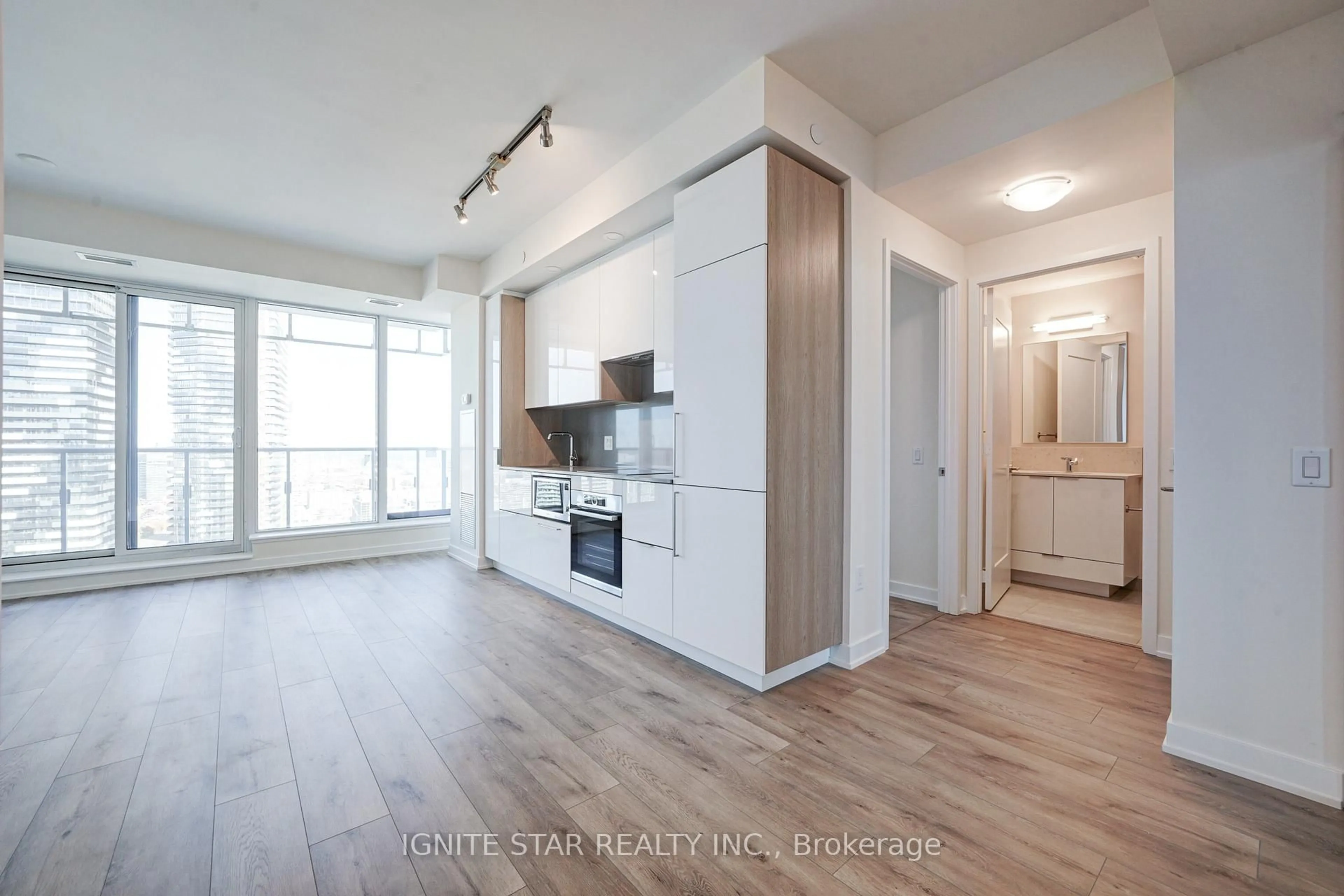 Open concept kitchen, wood/laminate floor for 28 Freeland St #4008, Toronto Ontario M5E 0E3
