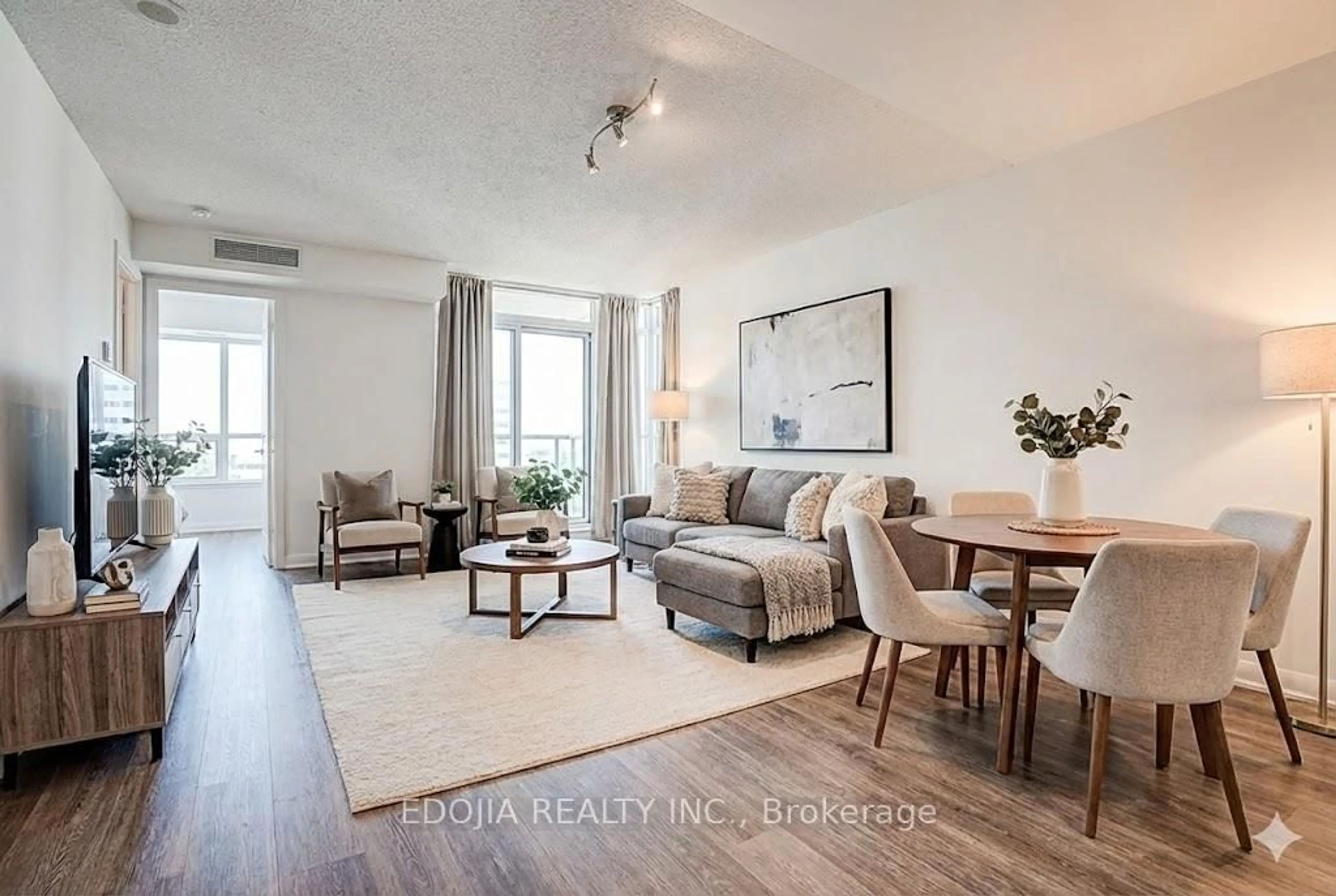 Living room with furniture, wood/laminate floor for 17 Anndale Dr #1617, Toronto Ontario M2N 2W7