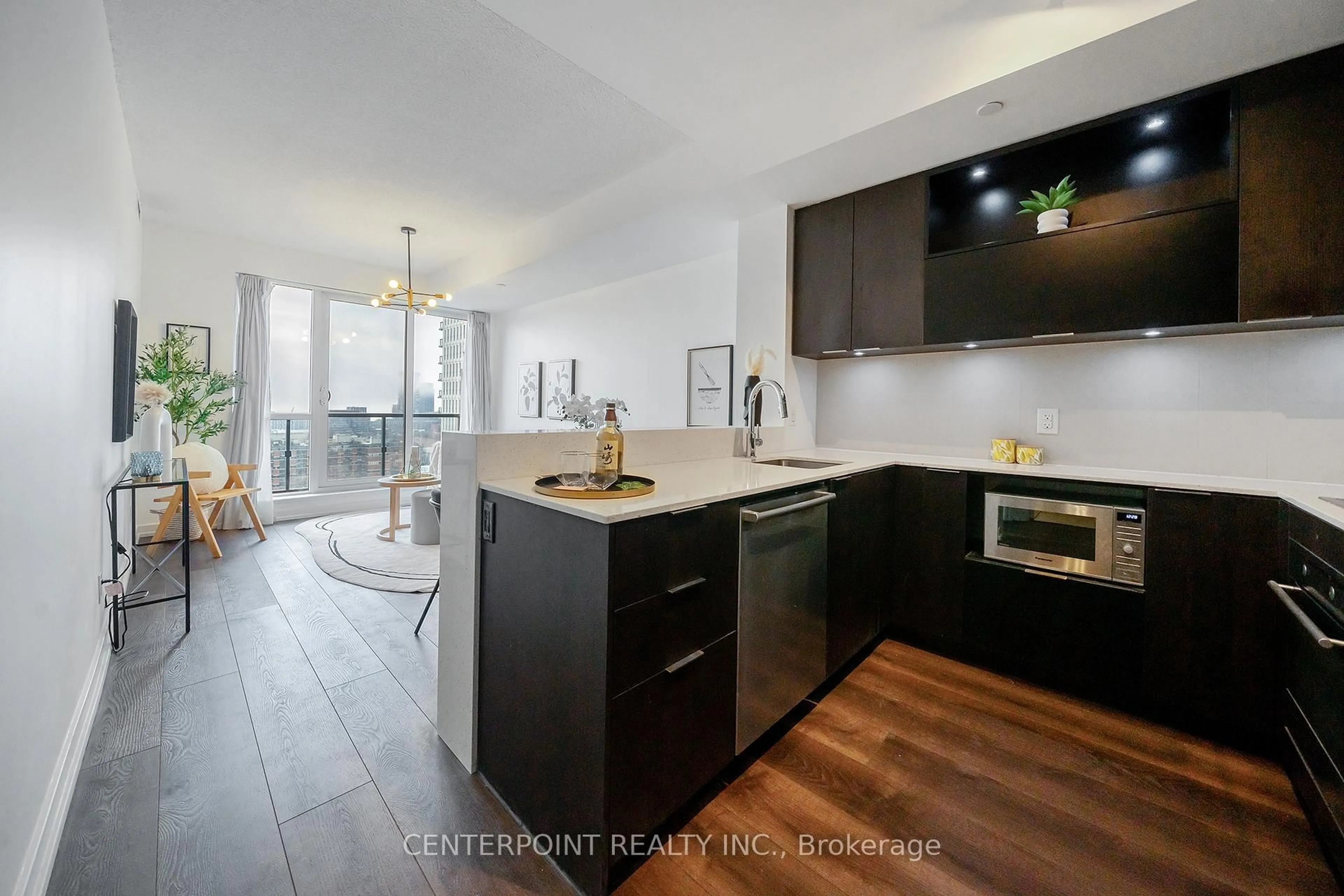 Open concept kitchen, wood/laminate floor for 170 Sumach St #1603, Toronto Ontario M5A 3K2