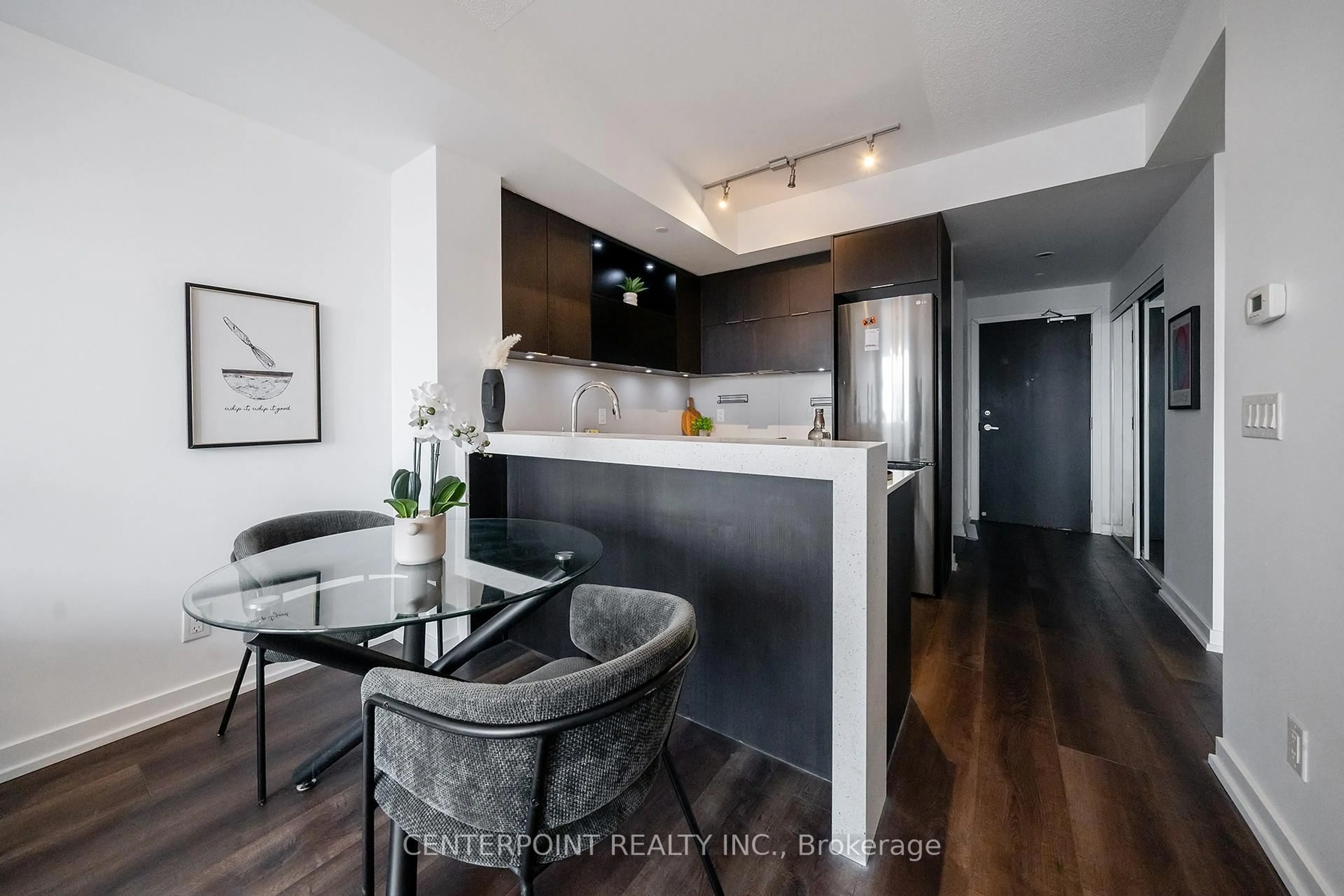Open concept kitchen, wood/laminate floor for 170 Sumach St #1603, Toronto Ontario M5A 3K2