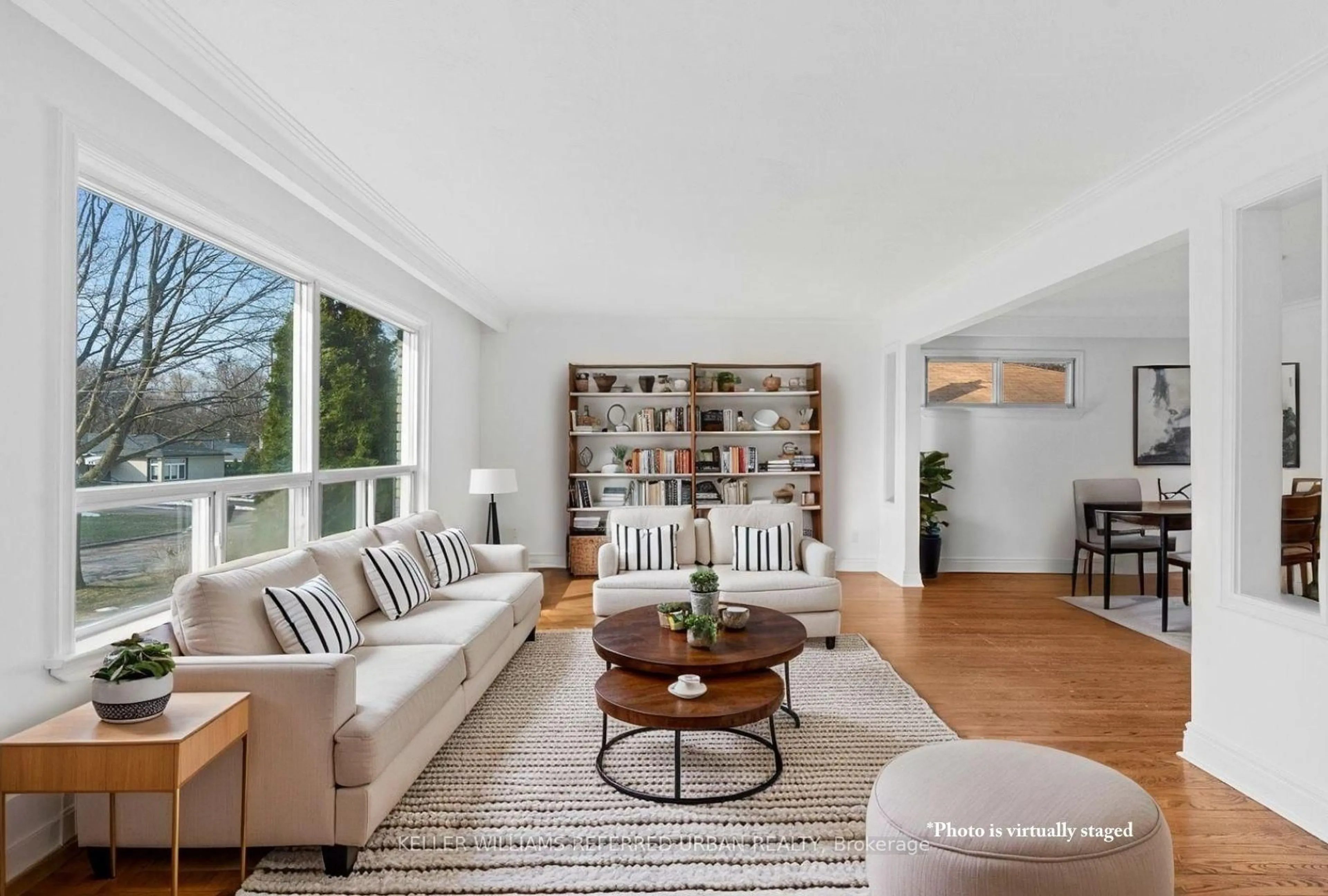 Living room with furniture, wood/laminate floor for 202 Park Home Ave, Toronto Ontario M2R 1A2