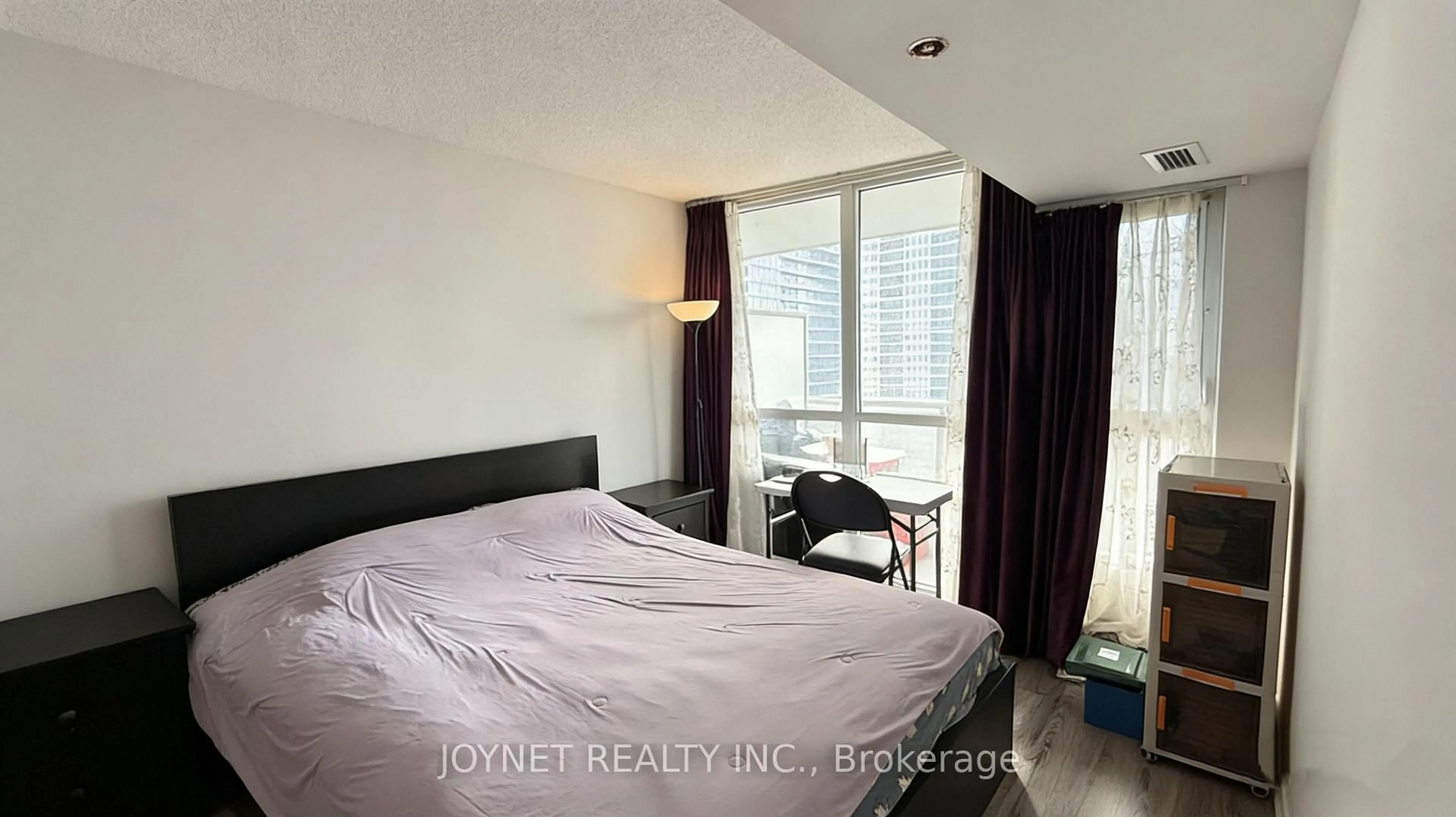 Bedroom with bed, wood/laminate floor for 75 Queens Wharf Rd #2111, Toronto Ontario M5V 0J8