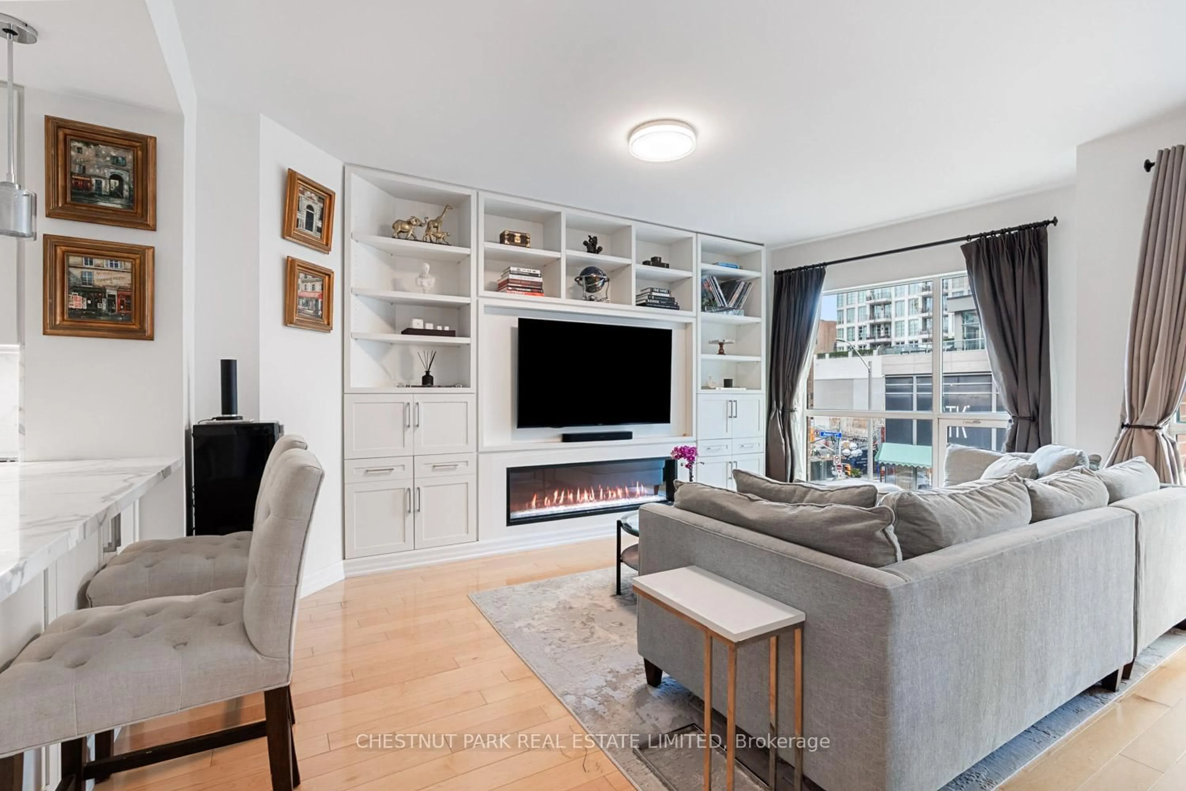 Living room with furniture, unknown for 38 Avenue Rd #304, Toronto Ontario M5R 2G2