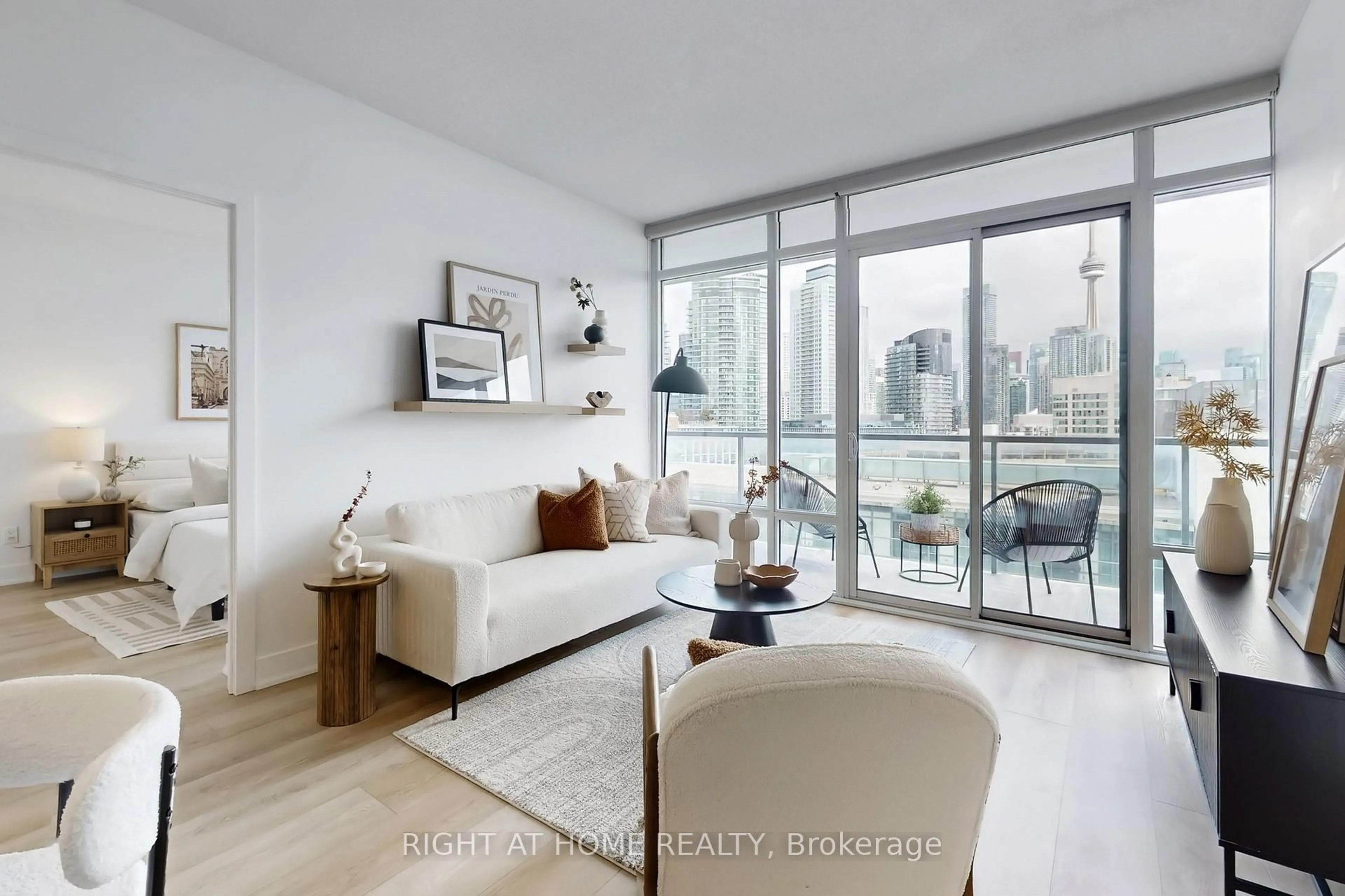 Living room with furniture, wood/laminate floor for 90 Stadium Rd #1101, Toronto Ontario M5V 3W5