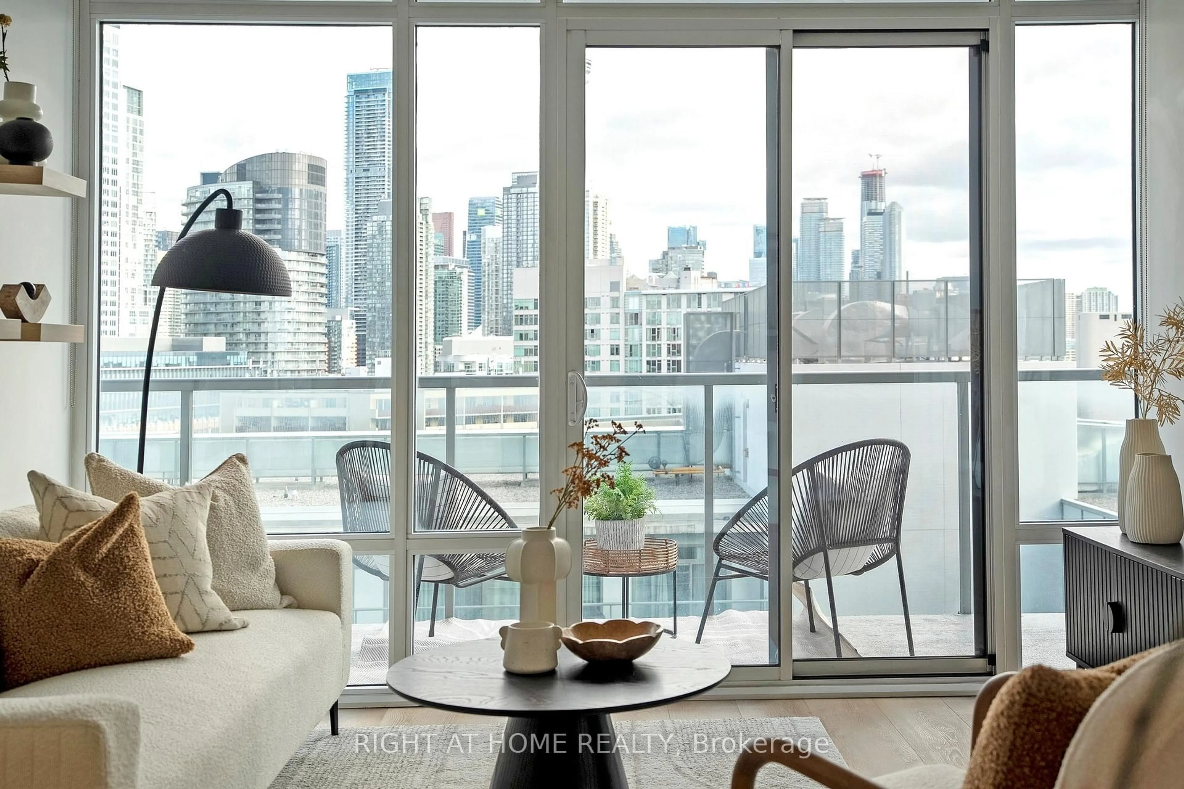 Living room with furniture, wood/laminate floor for 90 Stadium Rd #1101, Toronto Ontario M5V 3W5