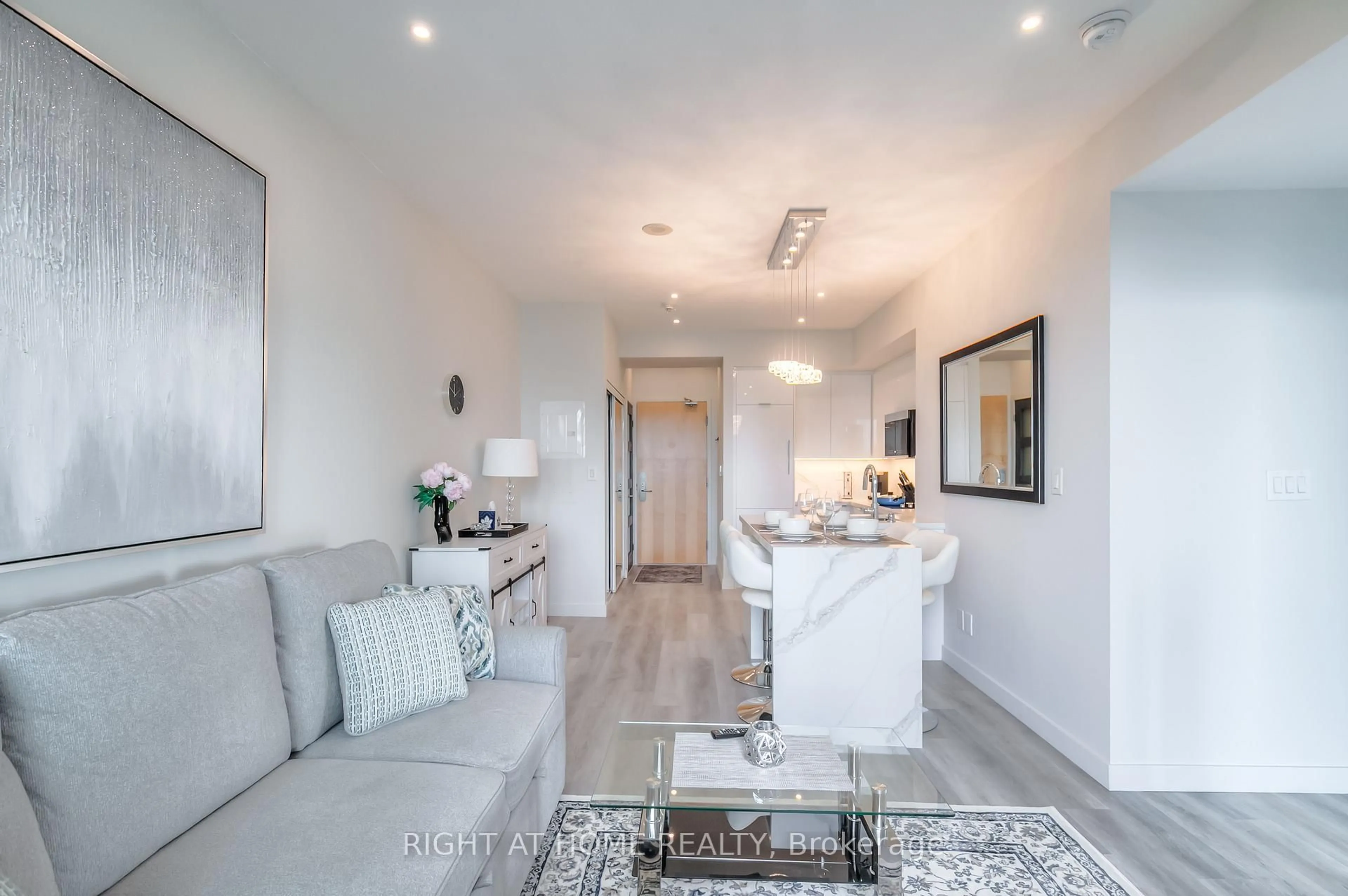 Living room with furniture, unknown for 65 Bremner Blvd #4802, Toronto Ontario M5J 0A7