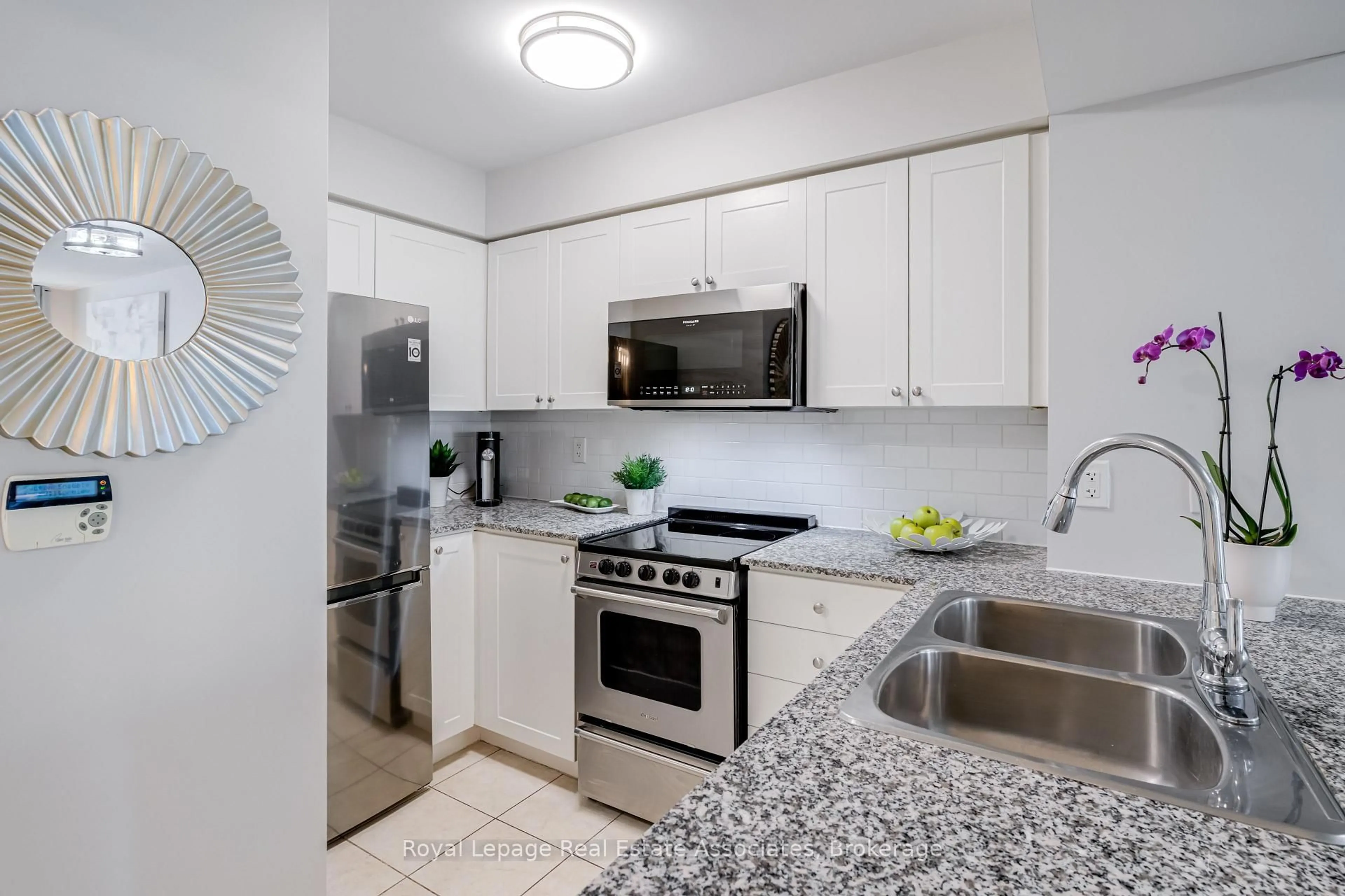 Standard kitchen, ceramic/tile floor for 50 Lynn Williams St #1002, Toronto Ontario M6K 3R9