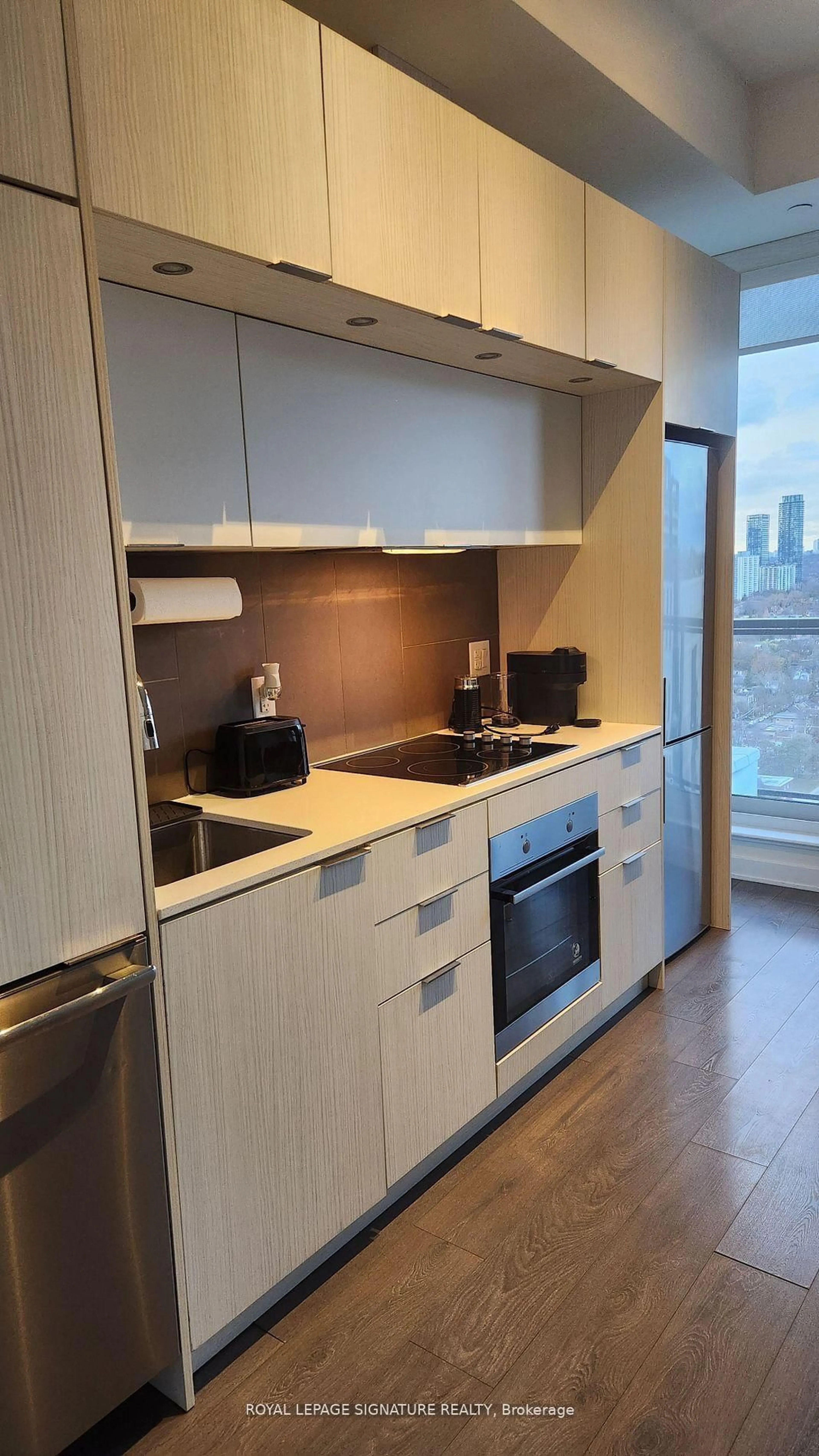 Standard kitchen, wood/laminate floor for 55 Regent Park Blvd #2811, Toronto Ontario M5A 3H6