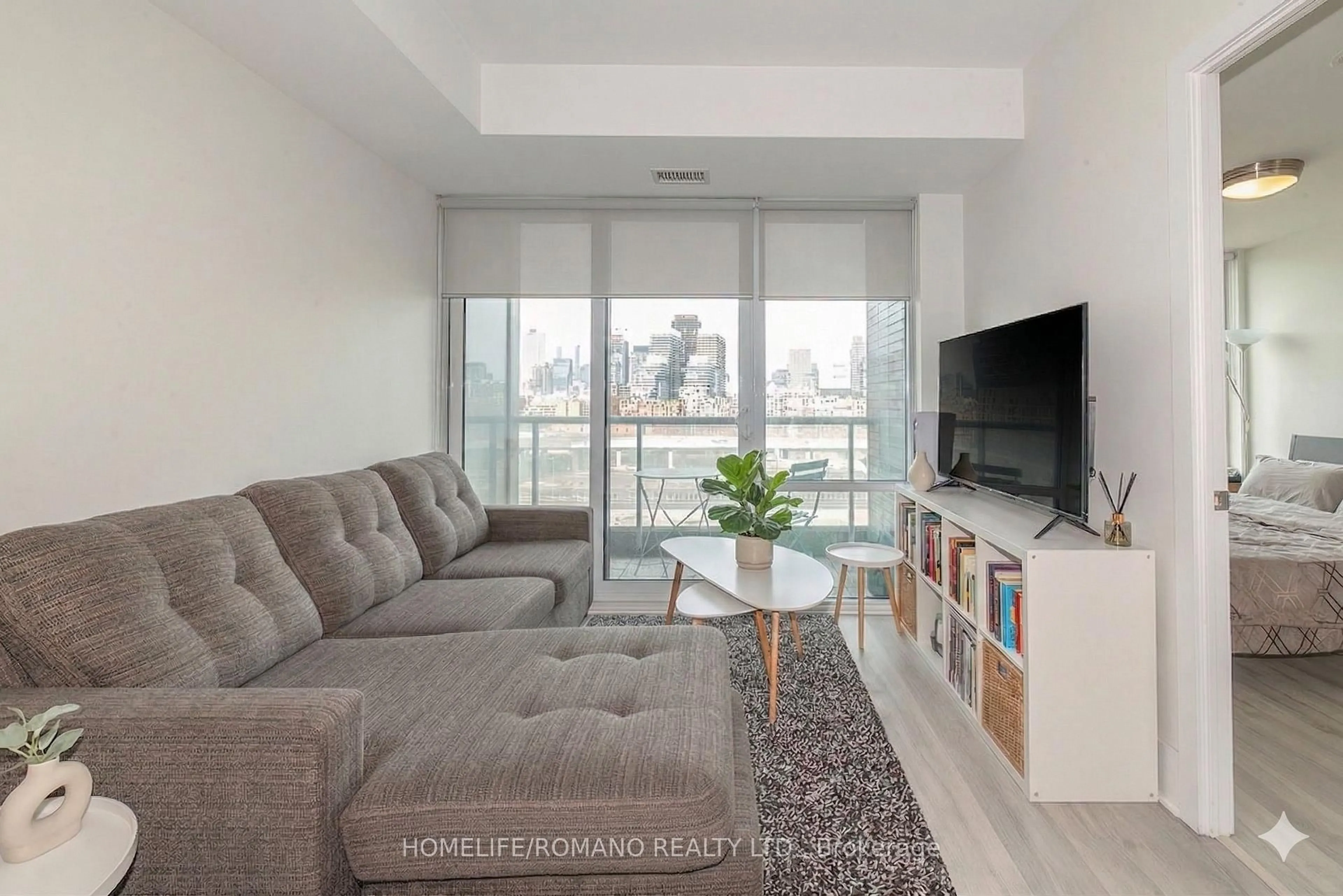 Living room with furniture, unknown for 1 Edgewater Dr #823, Toronto Ontario M5A 0L1