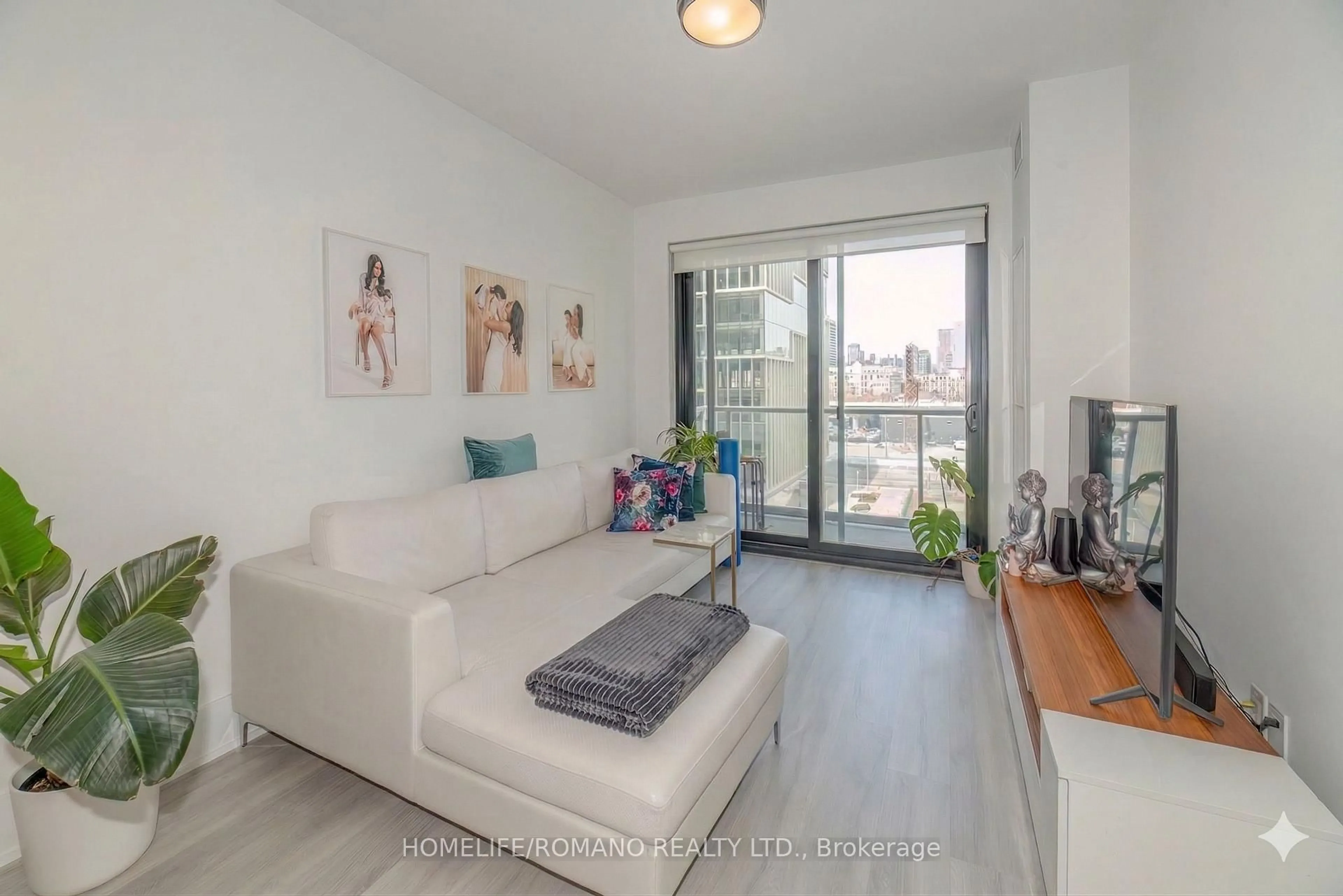 Living room with furniture, unknown for 118 Merchants' Warf #513, Toronto Ontario M5A 0L3