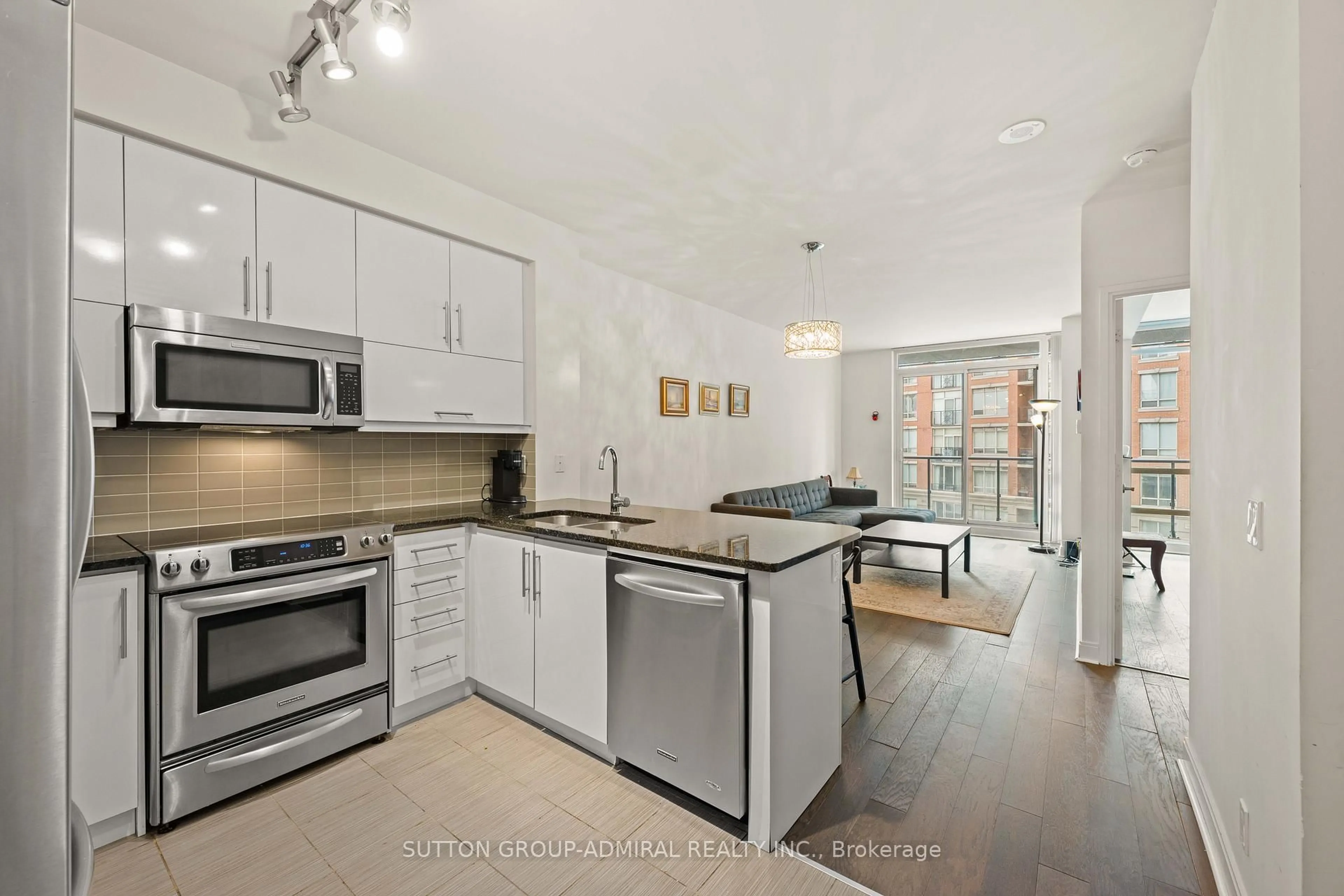 Open concept kitchen, unknown for 825 Church St #516, Toronto Ontario M4W 3Z4