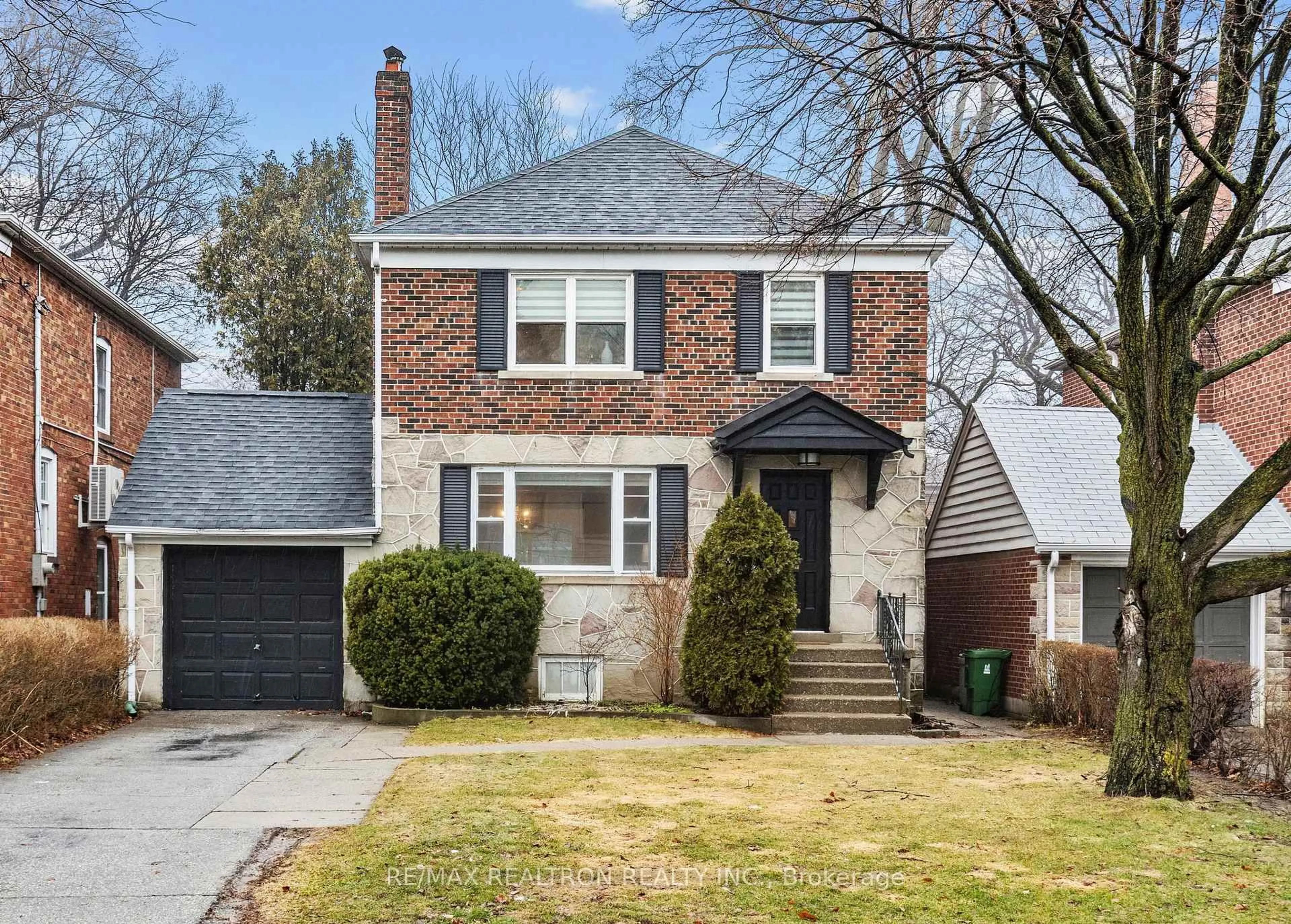 Home with brick exterior material, street for 38 Delhi Ave, Toronto Ontario M5M 3B7