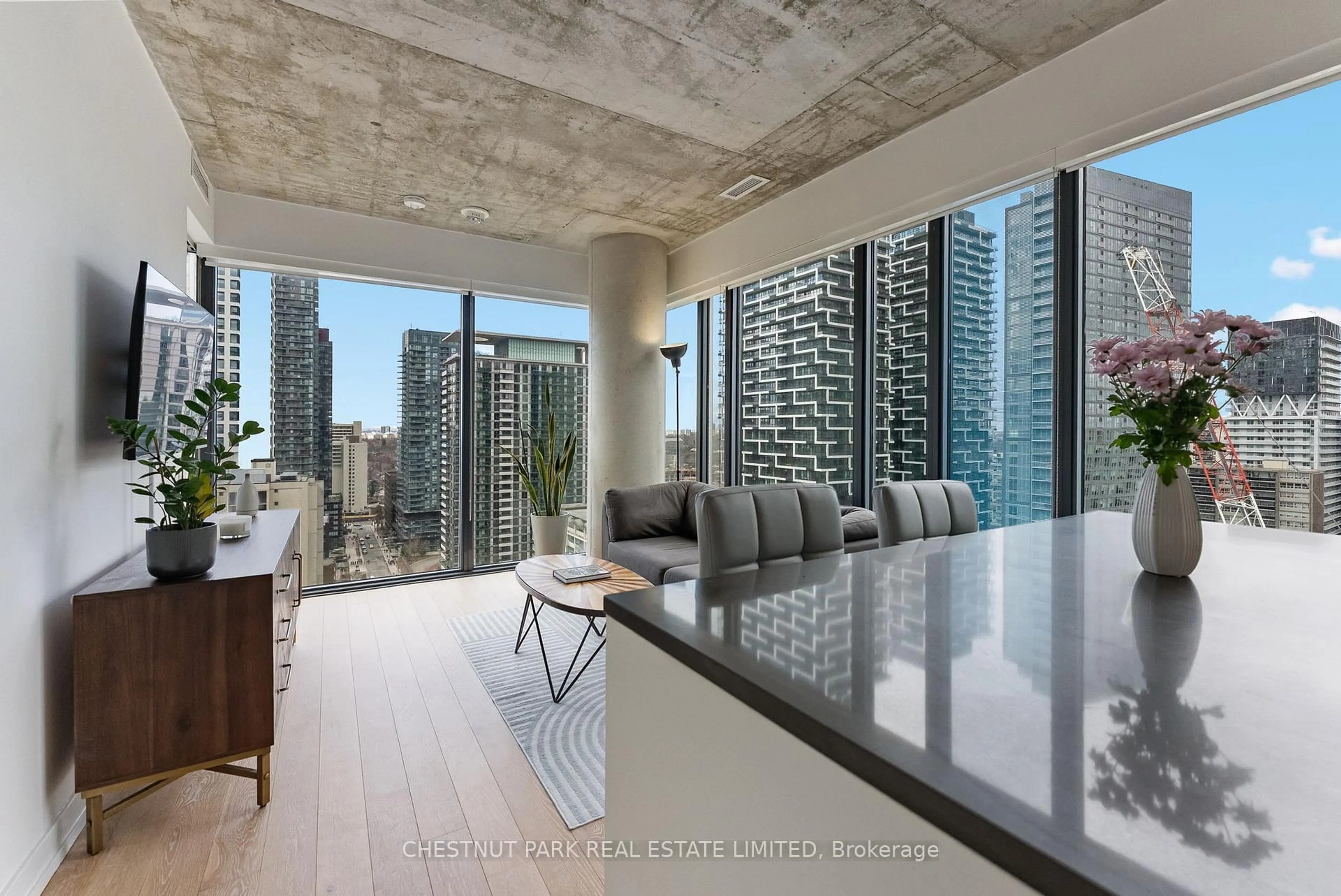 Open concept kitchen, cement floor for 161 Roehampton Ave #2303, Toronto Ontario M4P 0C8