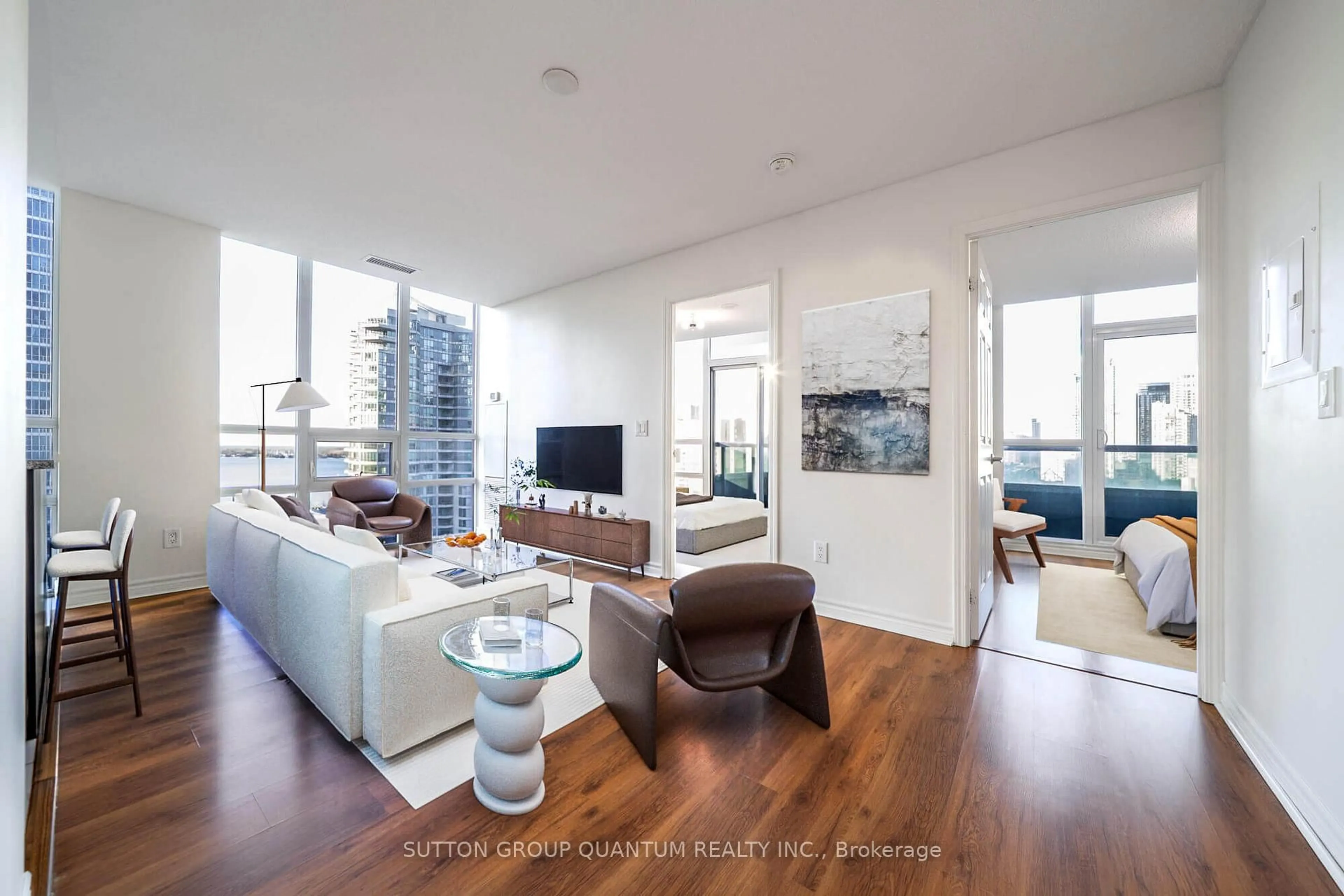 Living room with furniture, wood/laminate floor for 25 Lower Simcoe St #1708, Toronto Ontario M5J 3A1
