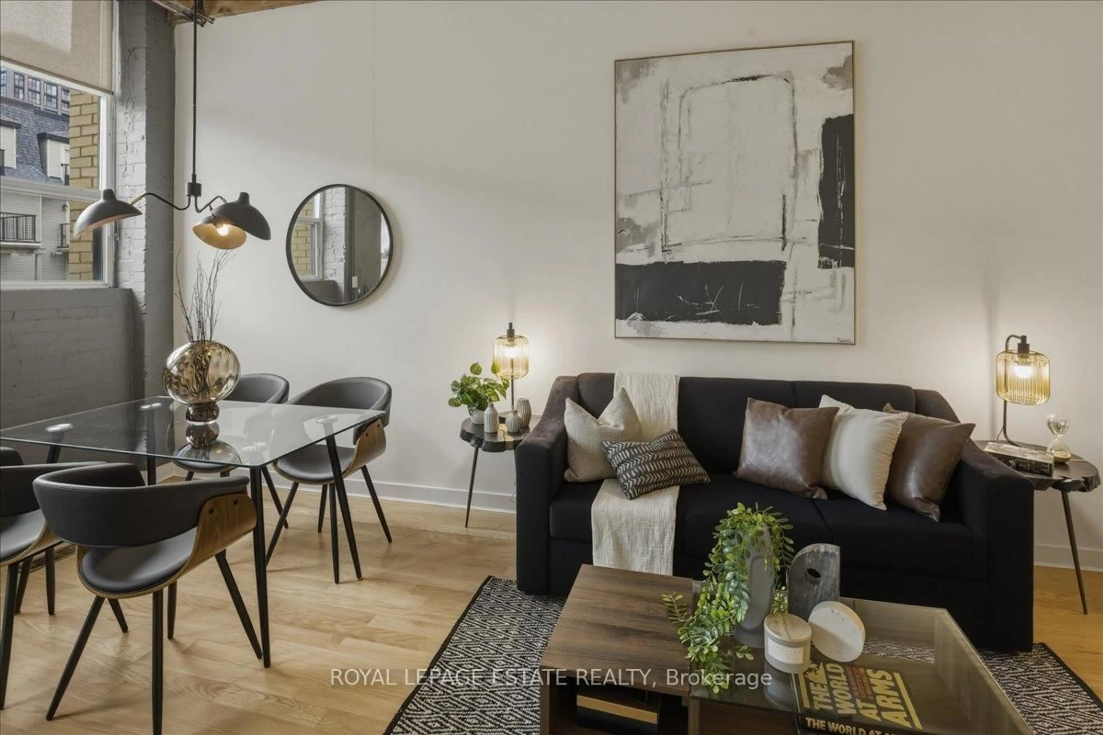 Living room with furniture, wood/laminate floor for 284 St Helen's Ave #105, Toronto Ontario M6H 4A4