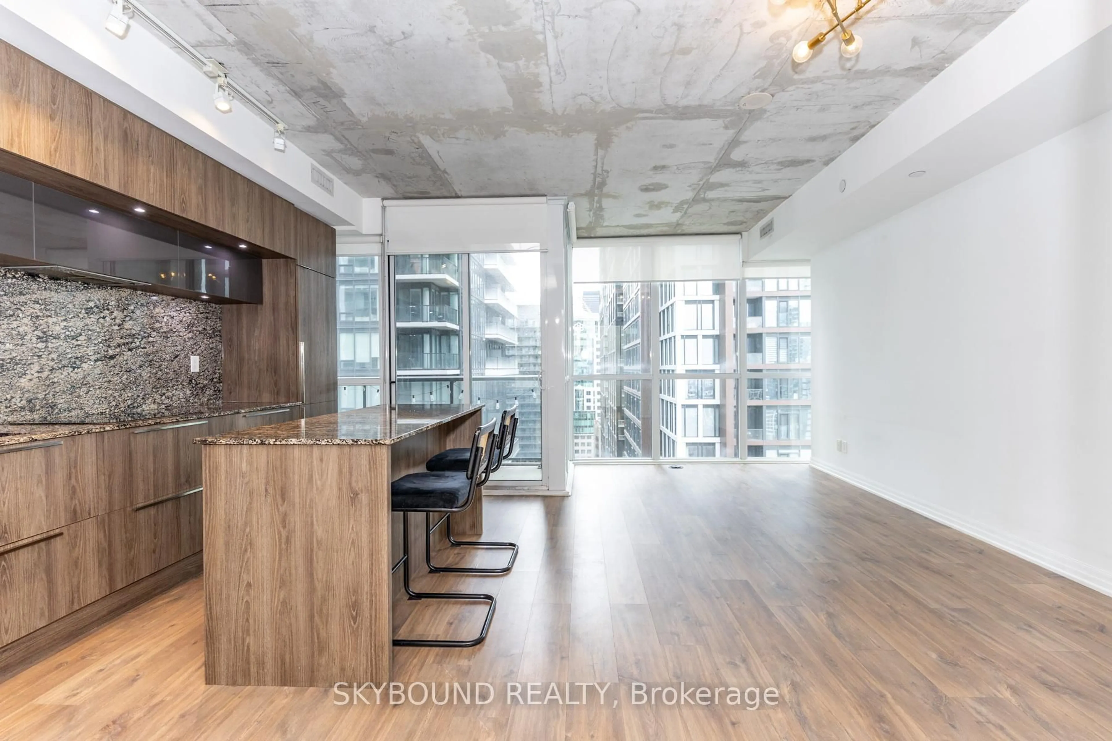 Open concept kitchen, cement floor for 88 Blue Jays Way #2704, Toronto Ontario M5V 0L7