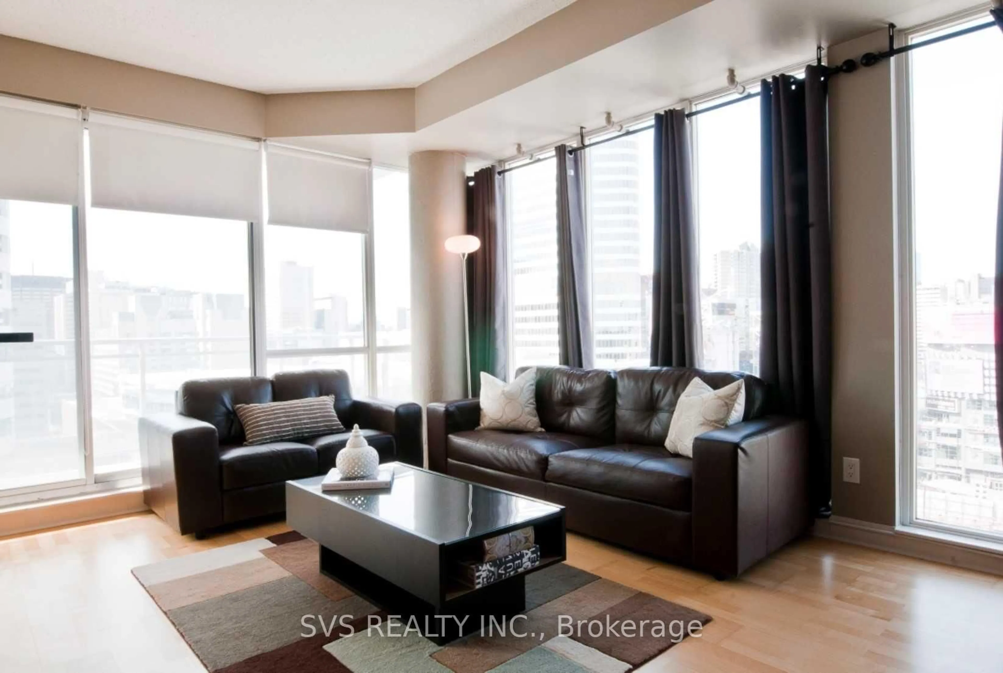 Living room with furniture, wood/laminate floor for 220 Victoria St #1609, Toronto Ontario M5B 2R6