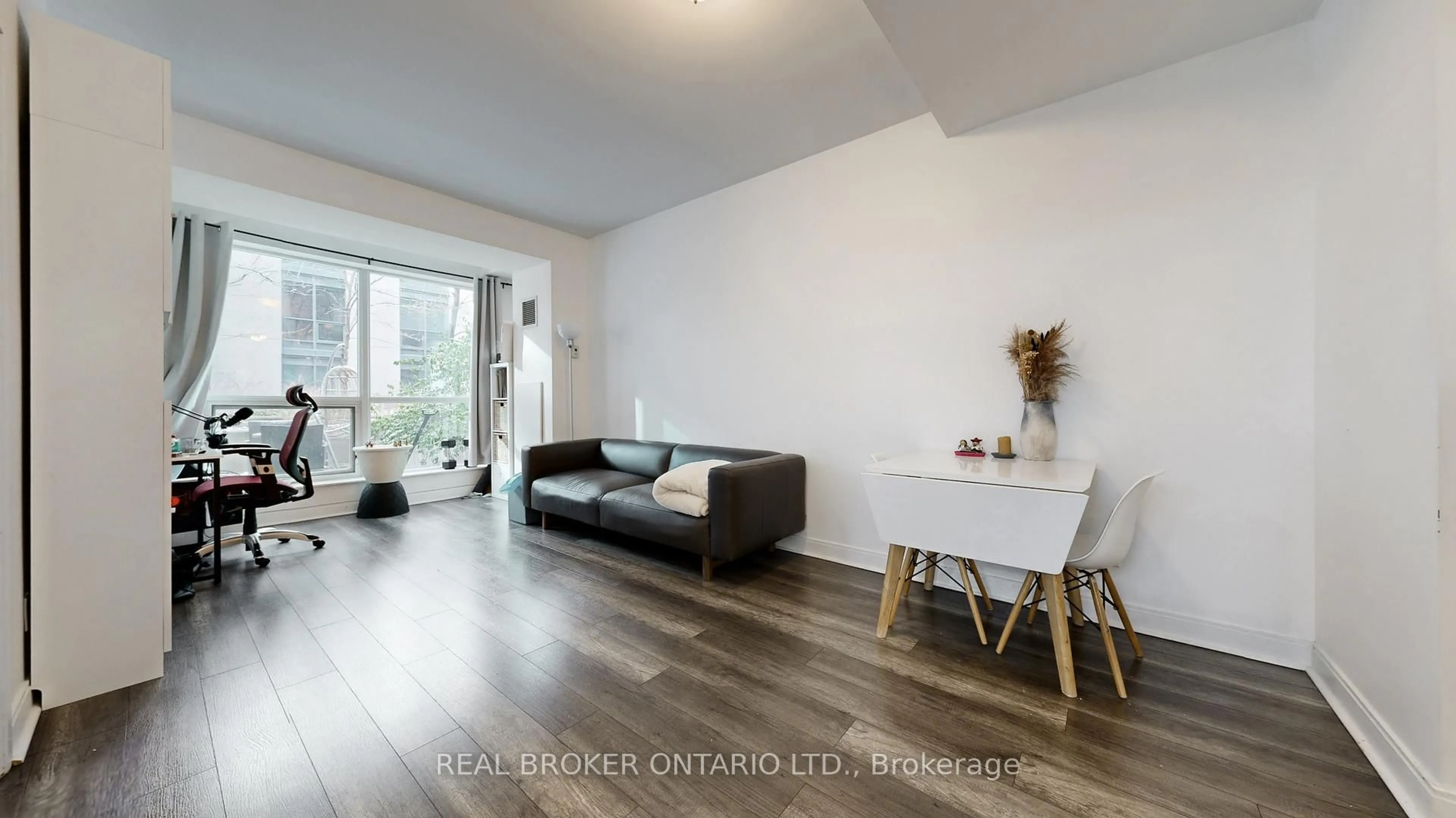 Living room with furniture, wood/laminate floor for 38 The Esplanade #313, Toronto Ontario M5E 1A5