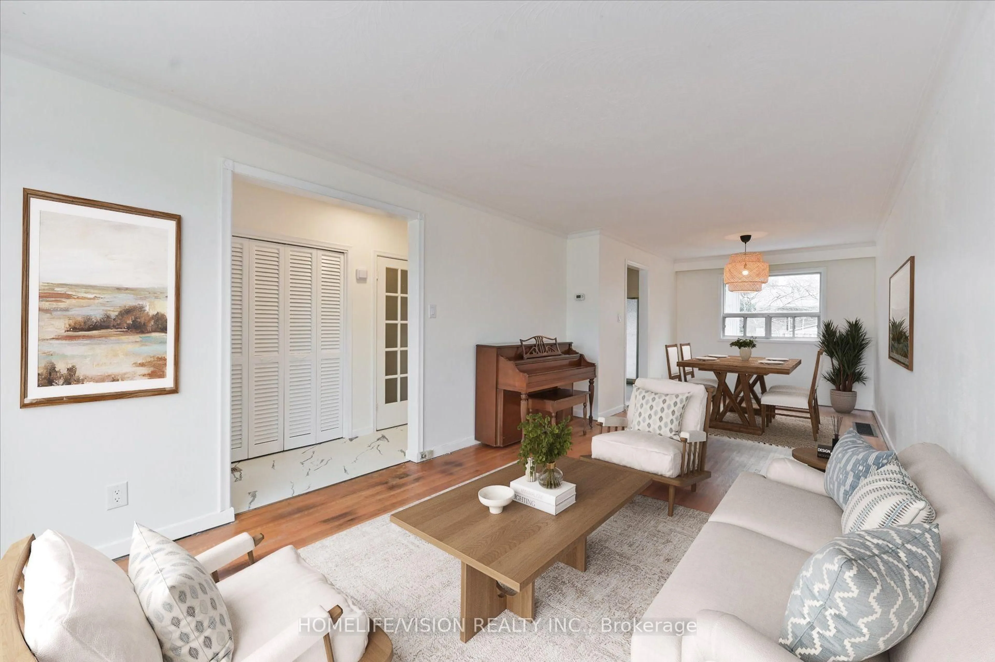 Living room with furniture, wood/laminate floor for 89 Tulane Cres, Toronto Ontario M3A 2C2