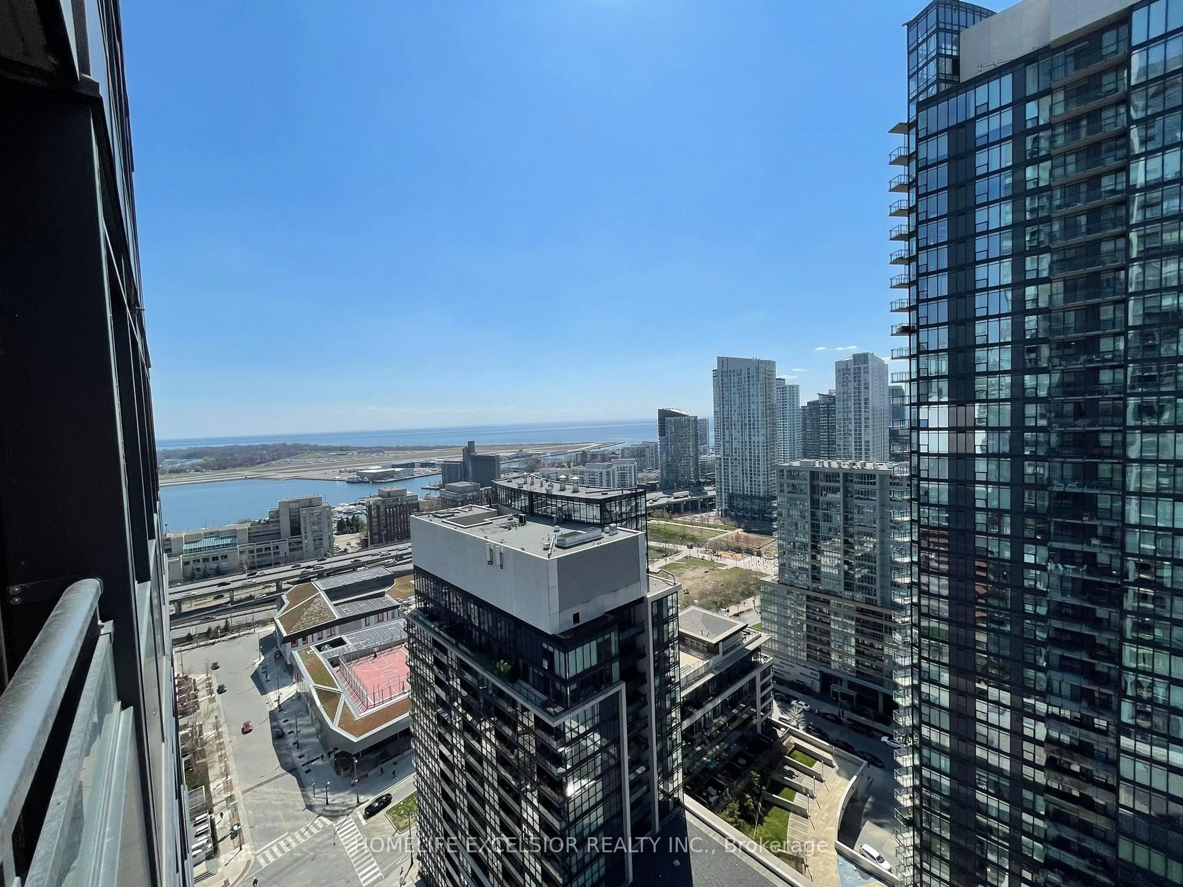 A pic from outside/outdoor area/front of a property/back of a property/a pic from drone, city buildings view from balcony for 25 Telegram Mews #3109, Toronto Ontario M5V 3Z1