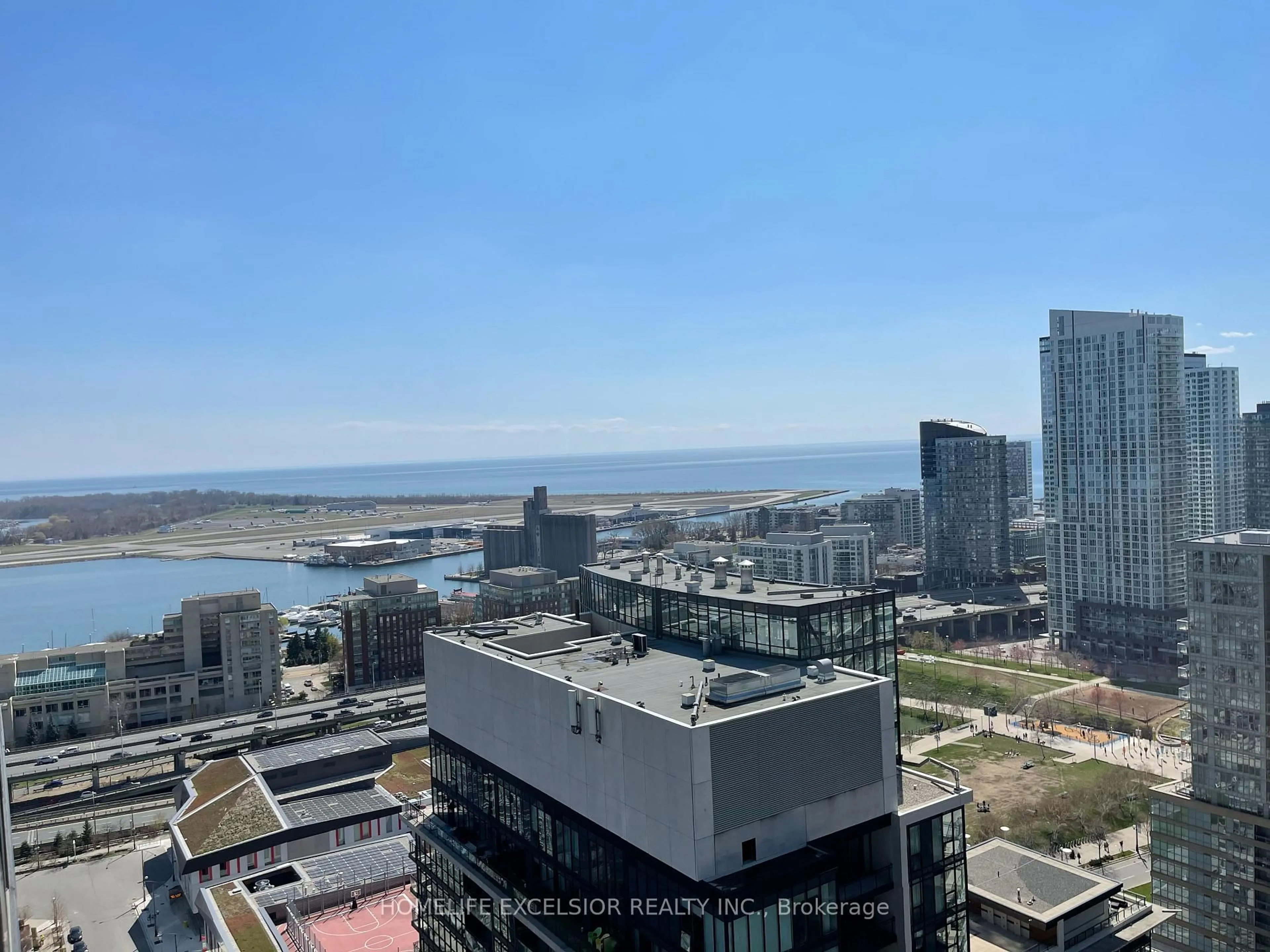 A pic from outside/outdoor area/front of a property/back of a property/a pic from drone, city buildings view from balcony for 25 Telegram Mews #3109, Toronto Ontario M5V 3Z1
