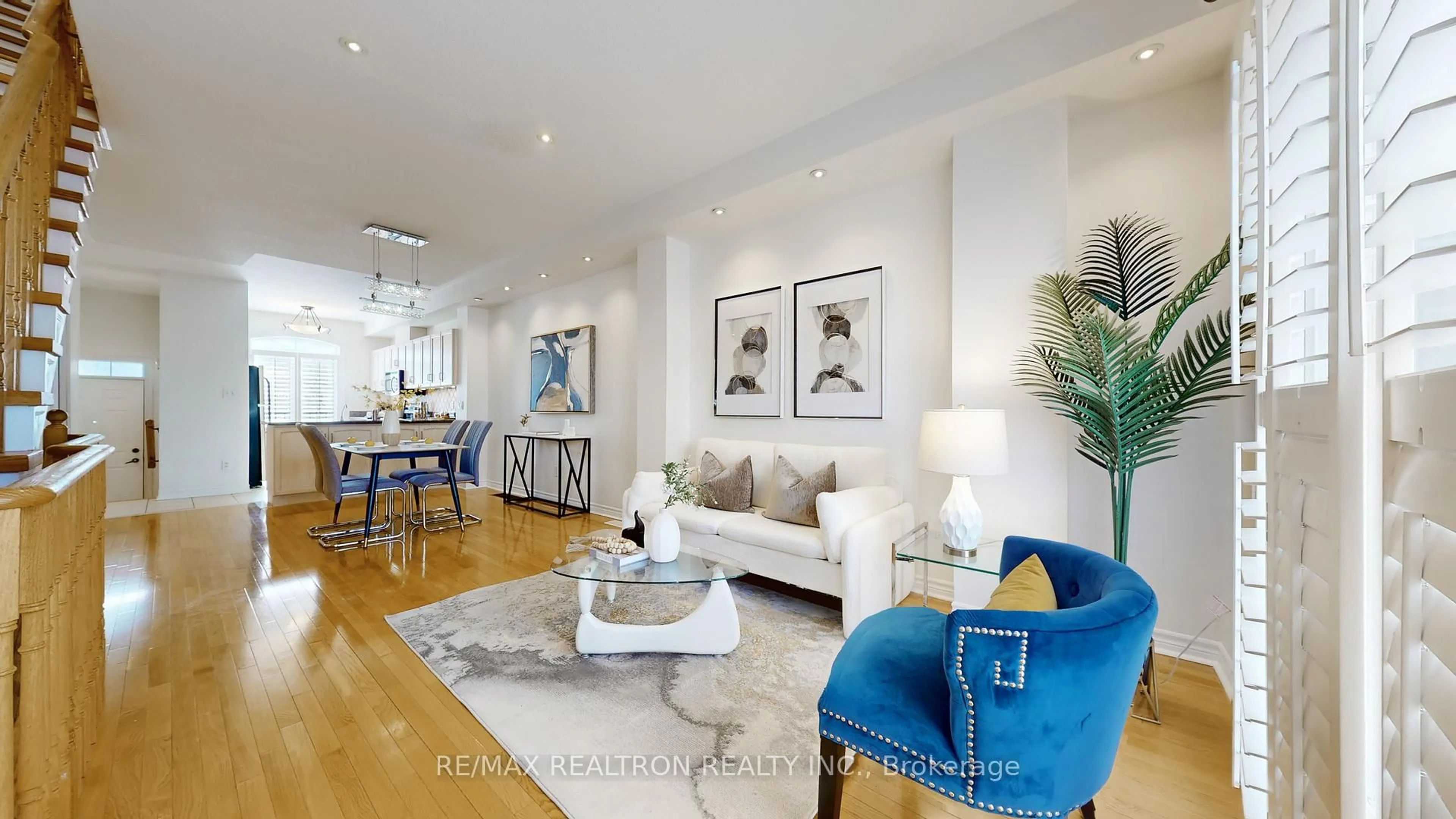 Living room with furniture, wood/laminate floor for 134B Finch Ave, Toronto Ontario M2N 2H9