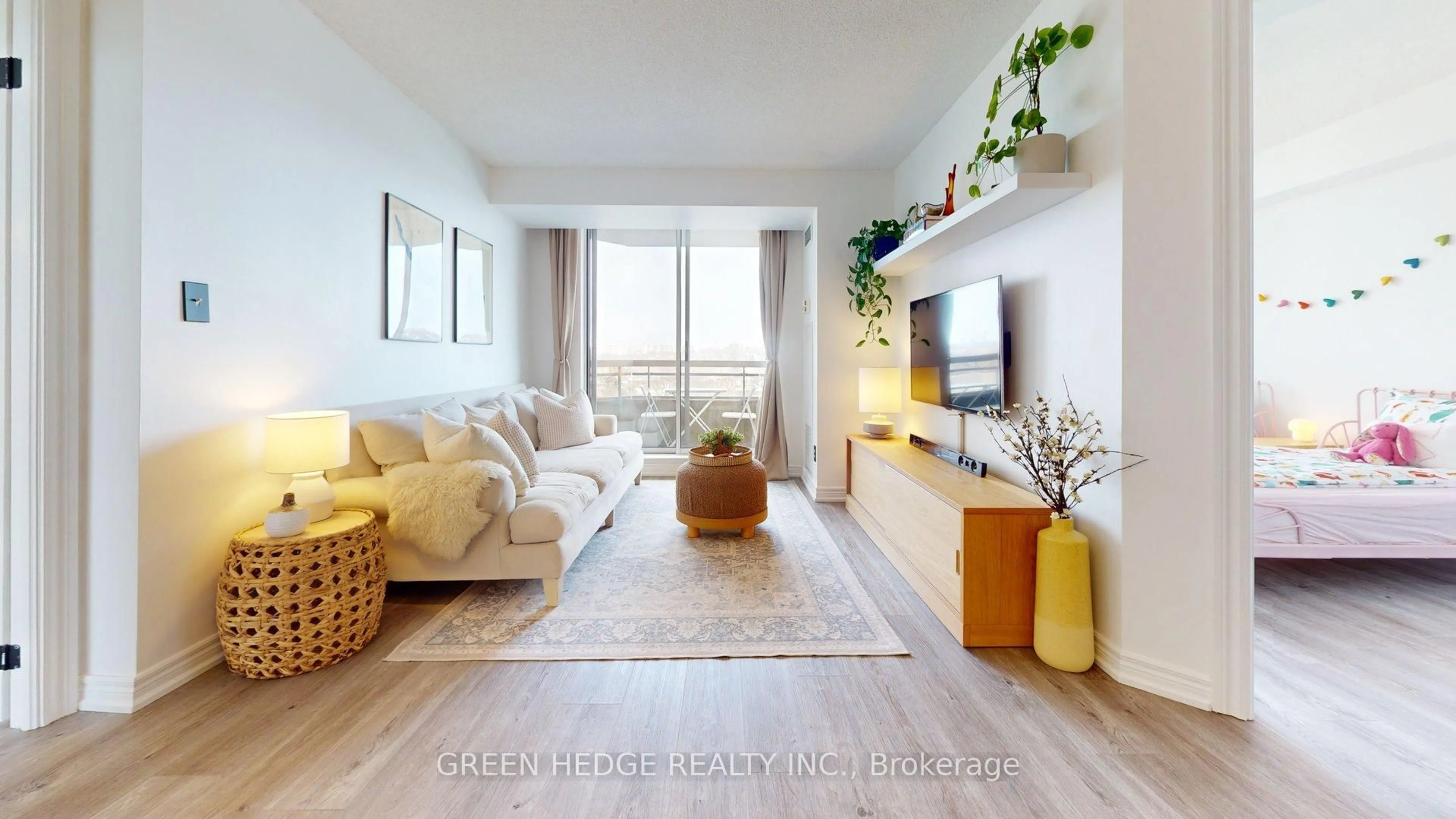 Living room with furniture, wood/laminate floor for 1700 Eglinton Ave #901, Toronto Ontario M4A 2X4