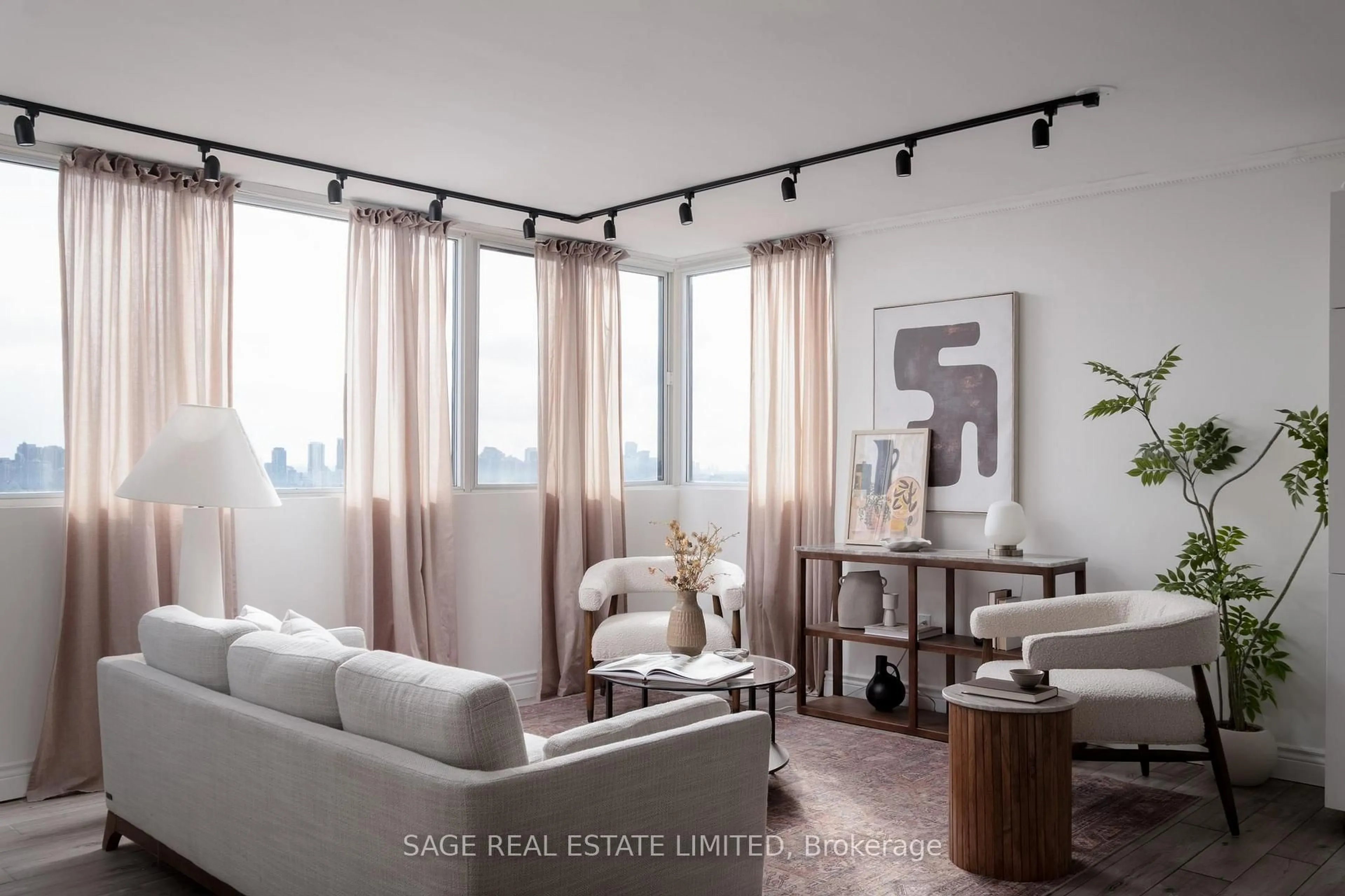 Living room with furniture, wood/laminate floor for 80 Antibes Dr #2506, Toronto Ontario M2R 3N5