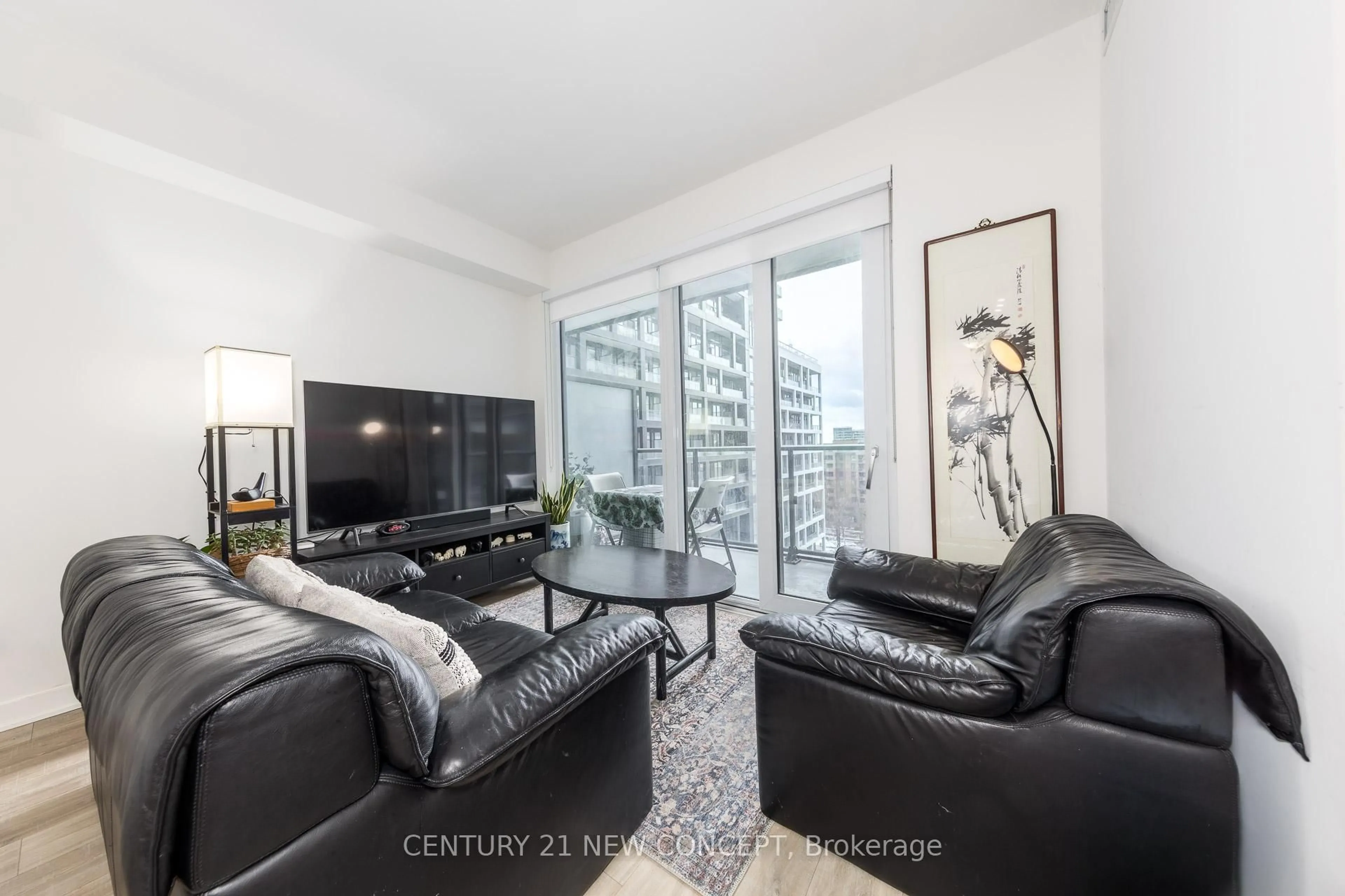 Living room with furniture, cement floor for 135 Lower Sherbourne St #738, Toronto Ontario M5A 0W8