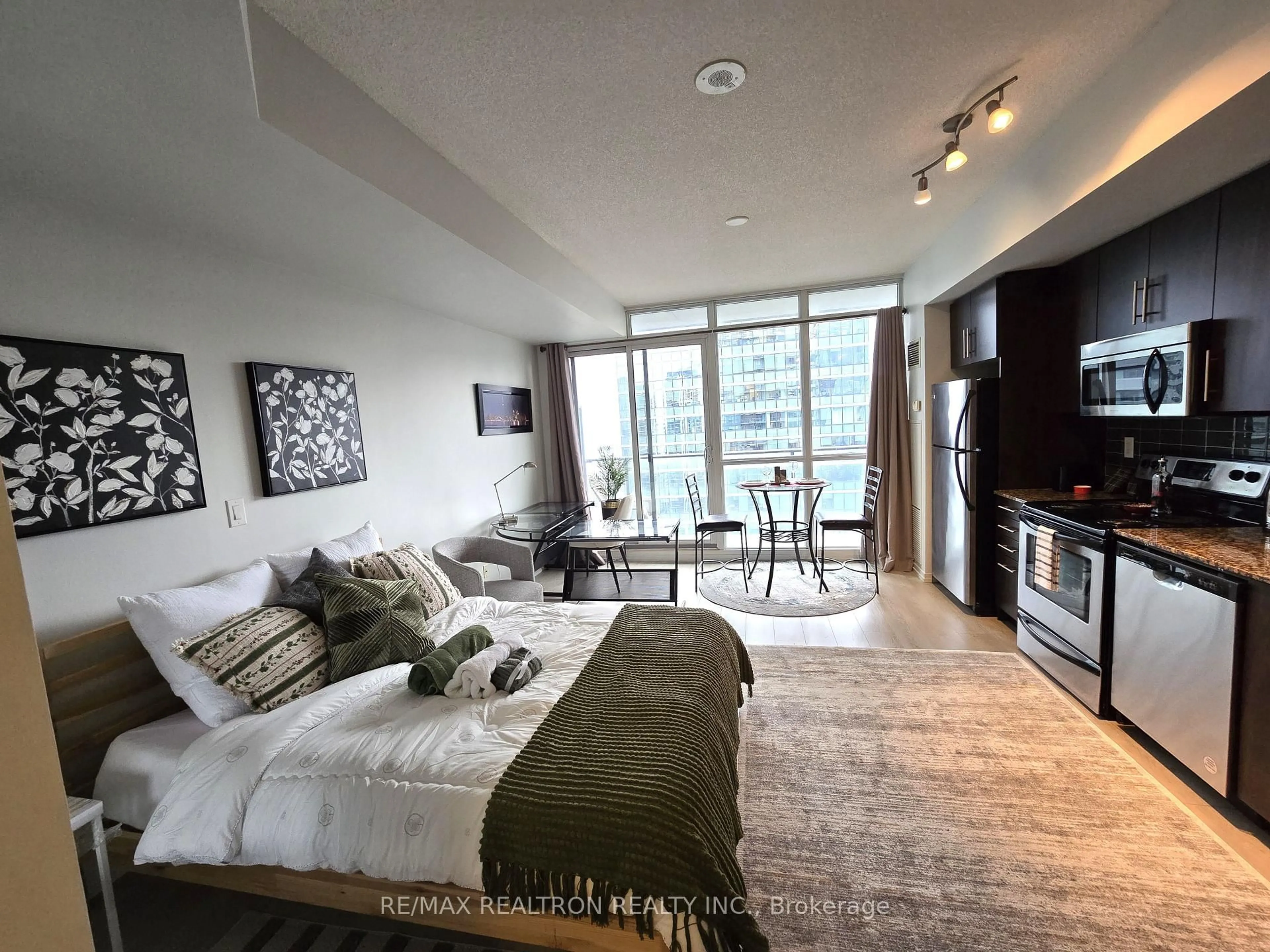 Living room with furniture, unknown for 65 Bremner Blvd #3903, Toronto Ontario M5V 3L9