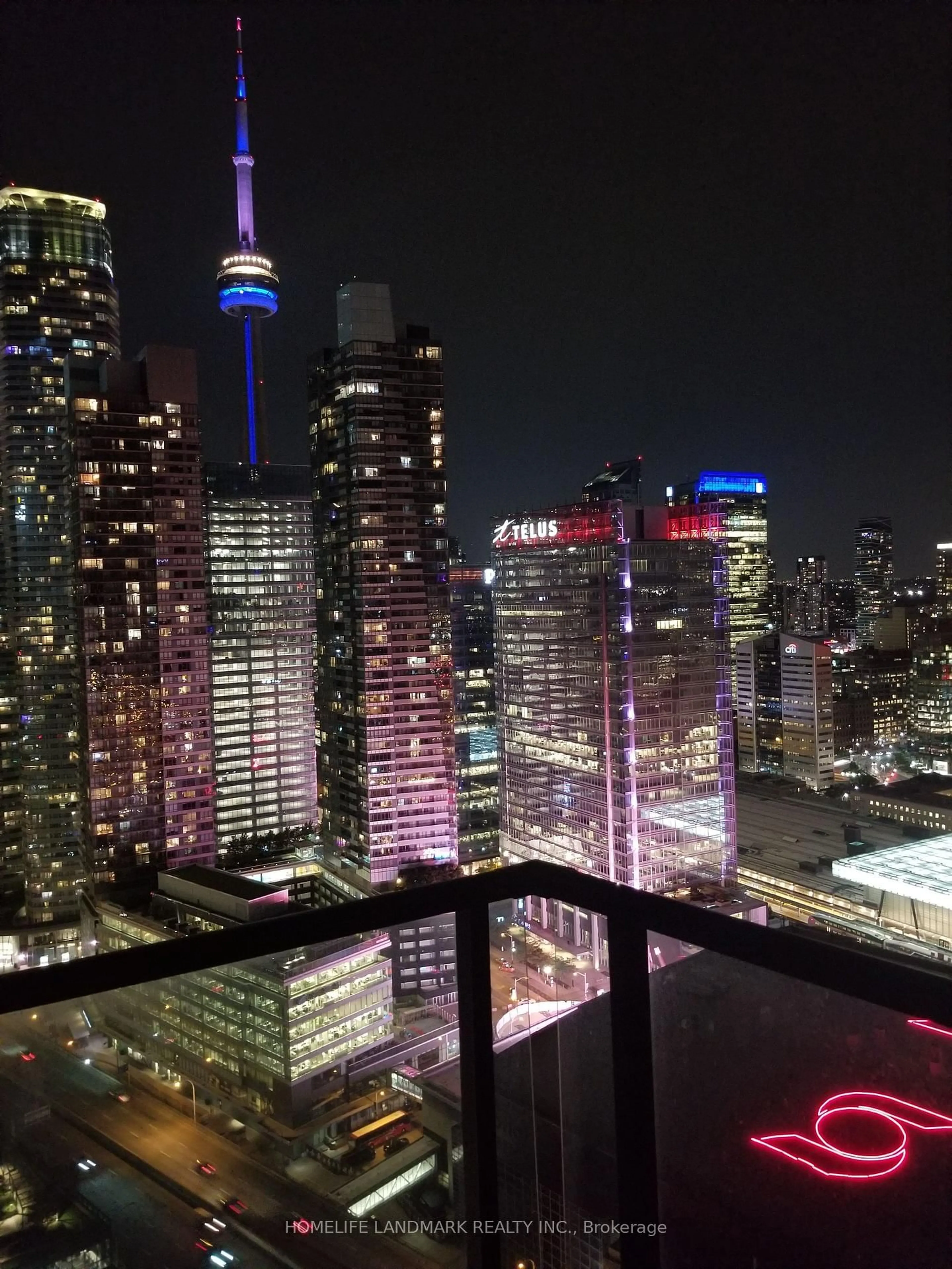 Balcony in the apartment, city buildings view from balcony for 33 Bay St #3813, Toronto Ontario M5J 2Z3