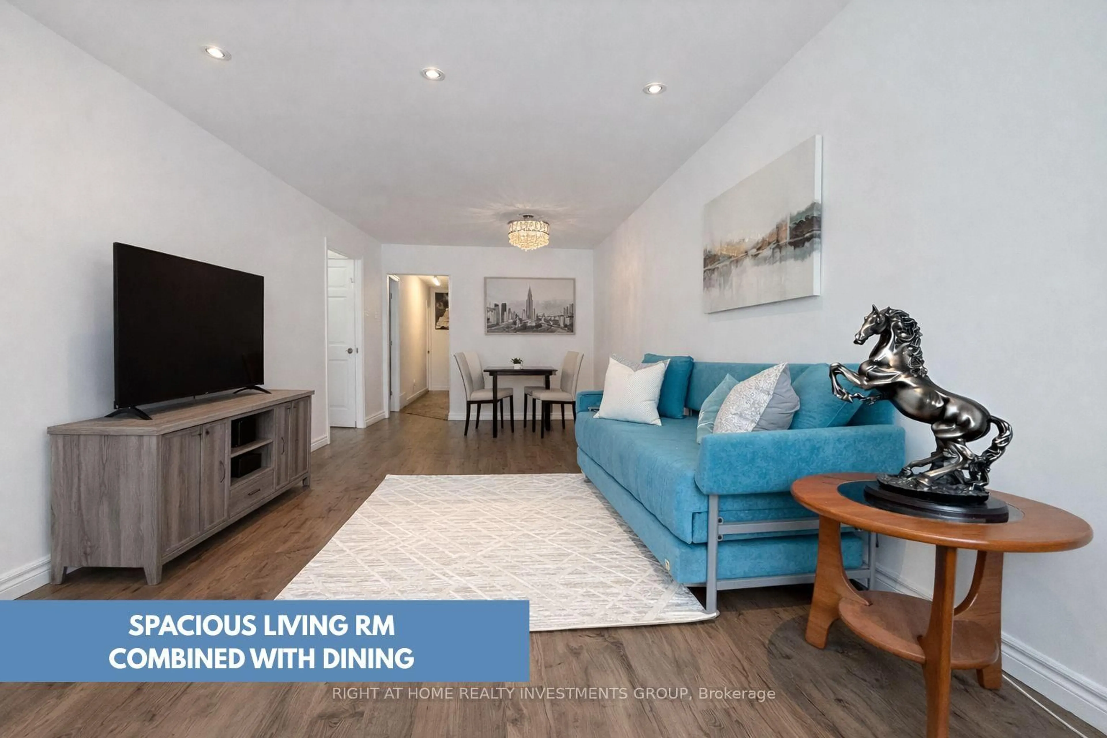 Living room with furniture, wood/laminate floor for 115 Elise Terr, Toronto Ontario M2R 2W9