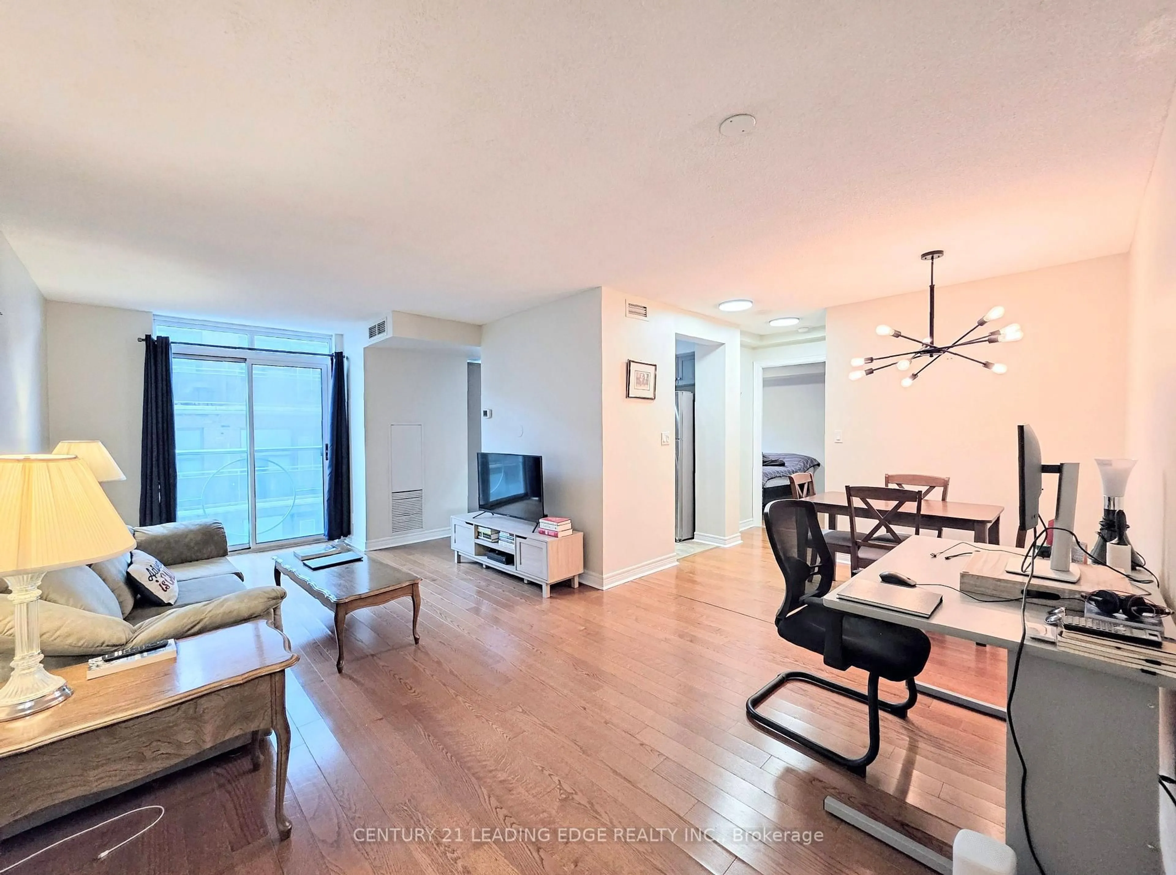 Living room with furniture, unknown for 212 Eglinton Ave #1012, Toronto Ontario M4P 0A3