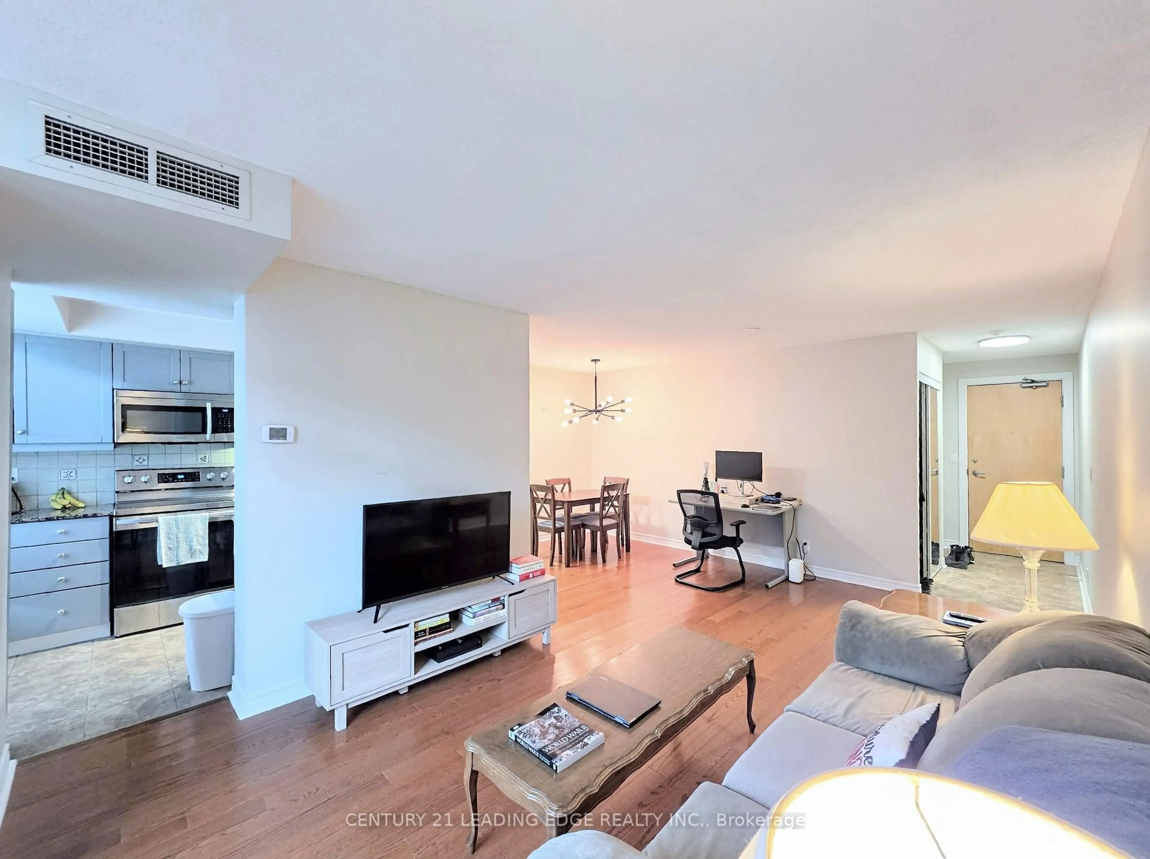 Living room with furniture, unknown for 212 Eglinton Ave #1012, Toronto Ontario M4P 0A3
