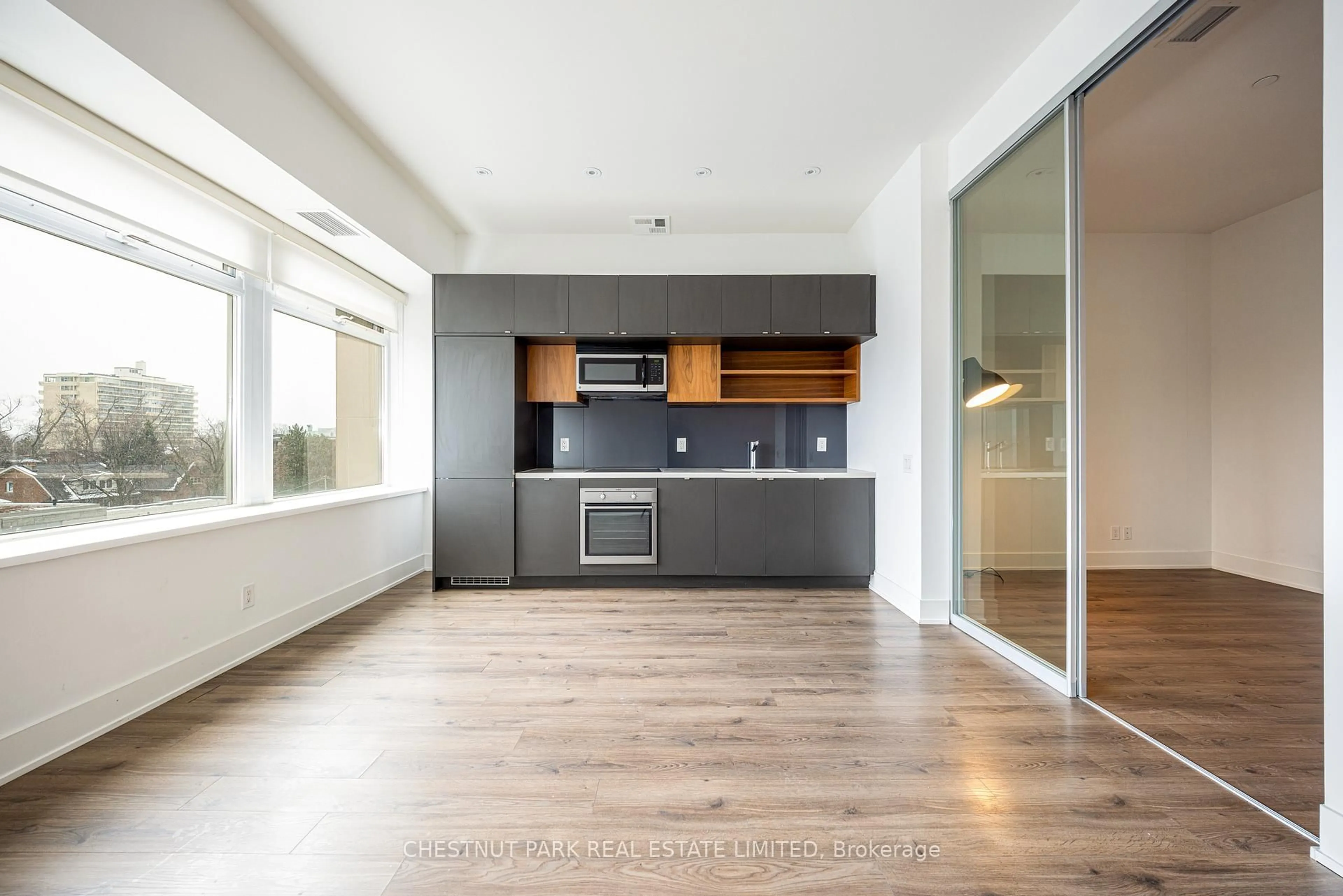 Open concept kitchen, unknown for 111 St Clair Ave #416, Toronto Ontario M4V 1N5