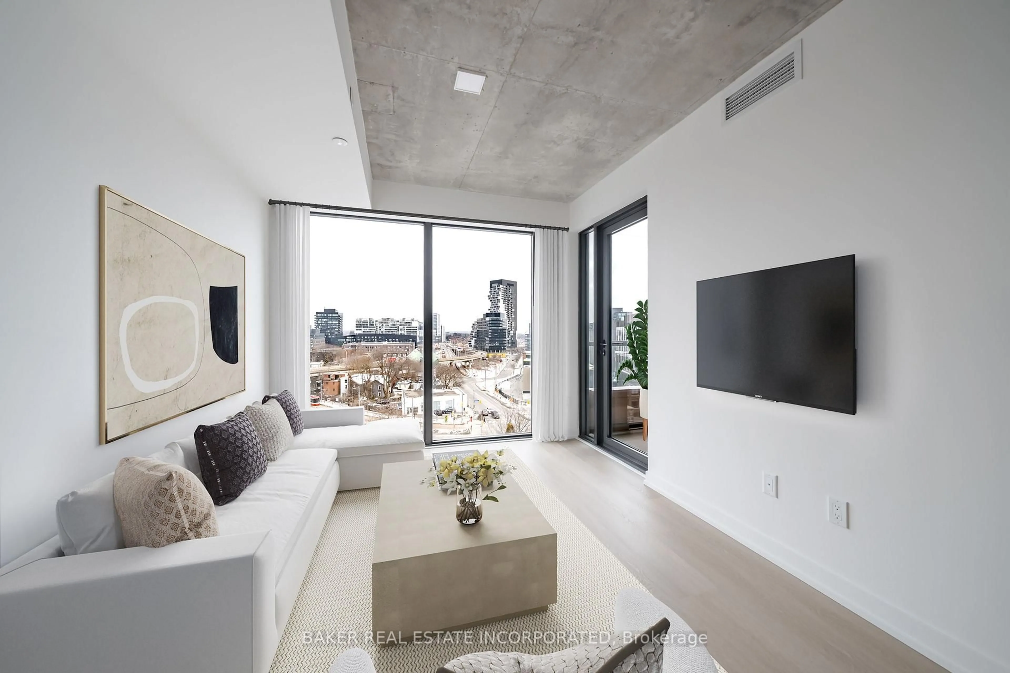 Living room with furniture, cement floor for 28 Eastern Ave #809, Toronto Ontario M5A 0Y2