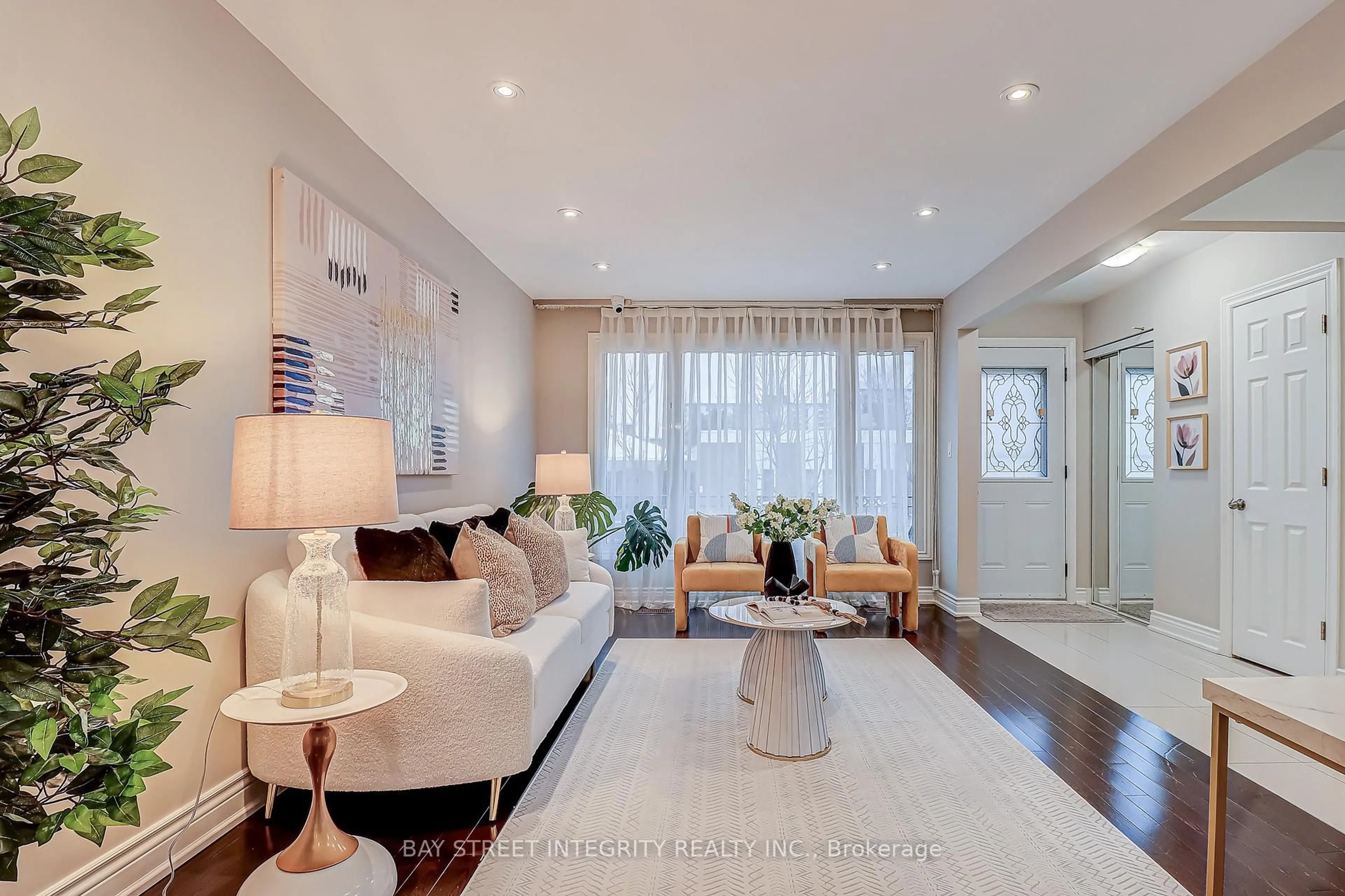 Living room with furniture, wood/laminate floor for 12 Combermere Dr, Toronto Ontario M3A 2W3