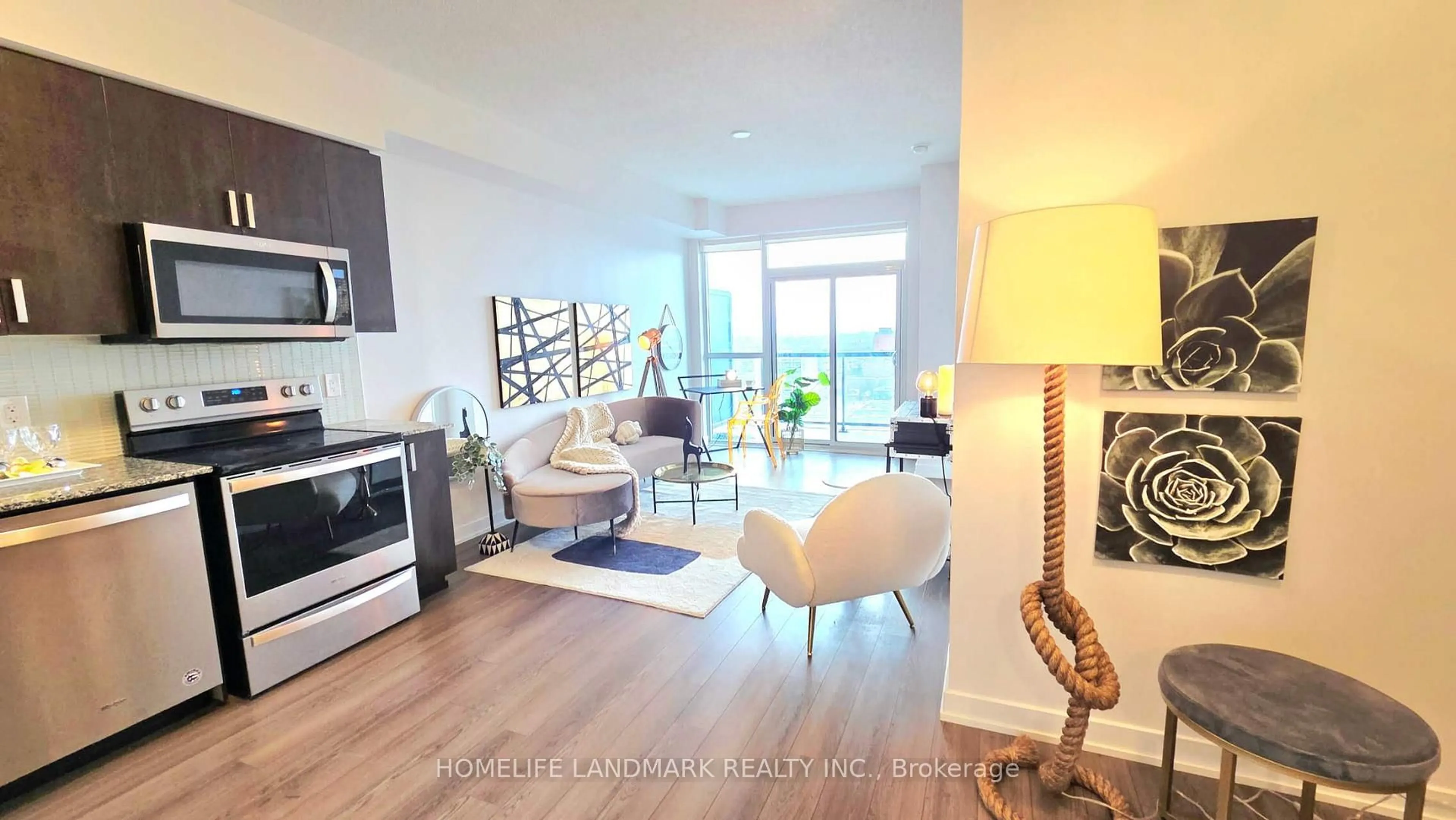 Living room with furniture, wood/laminate floor for 1603 Eglinton Ave #1507, Toronto Ontario M6E 2H1