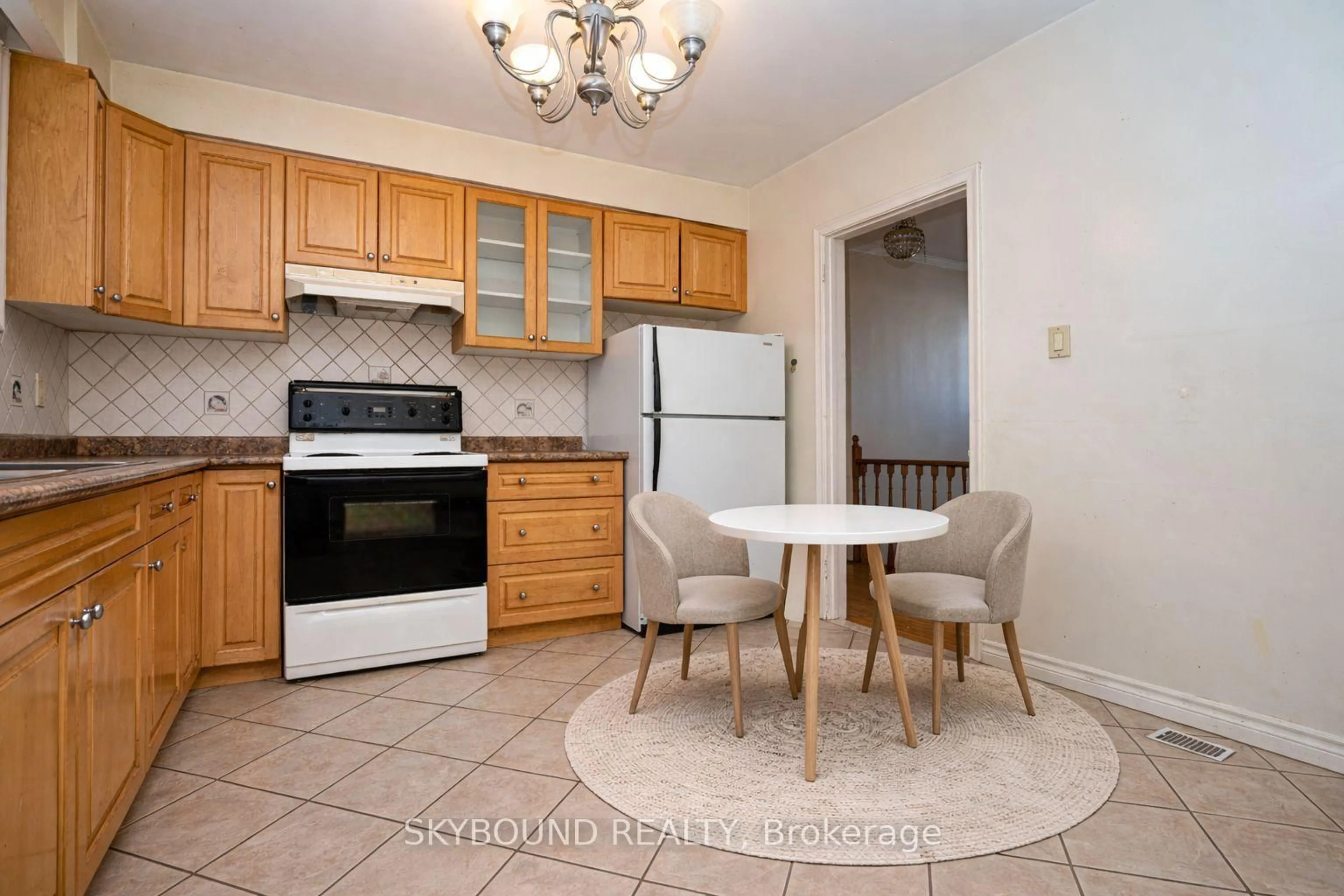 Standard kitchen, ceramic/tile floor for 9 Caronport Cres, Toronto Ontario M3A 1G9