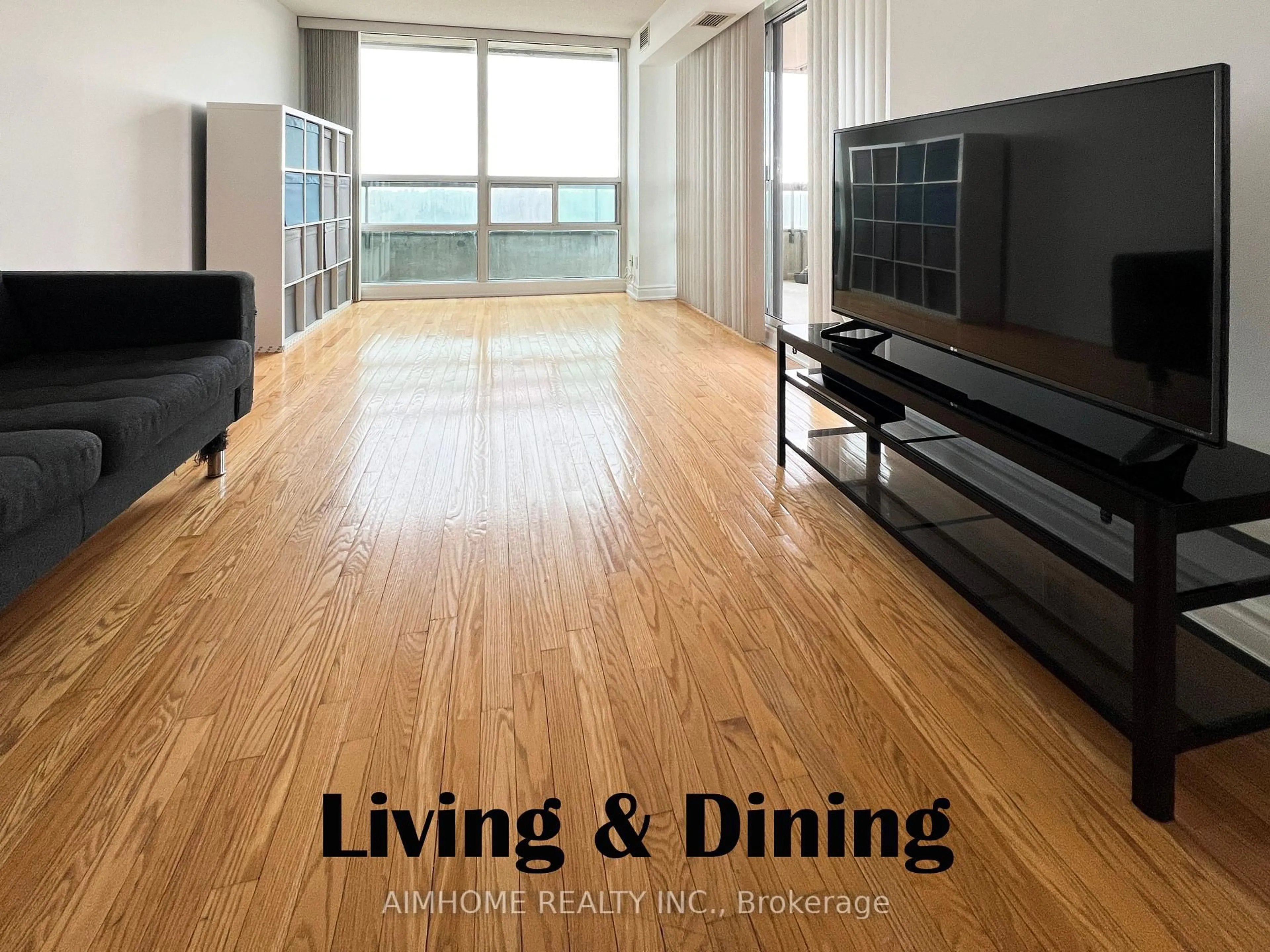 Living room with furniture, wood/laminate floor for 509 Beecroft Rd #809, Toronto Ontario M2N 0A3
