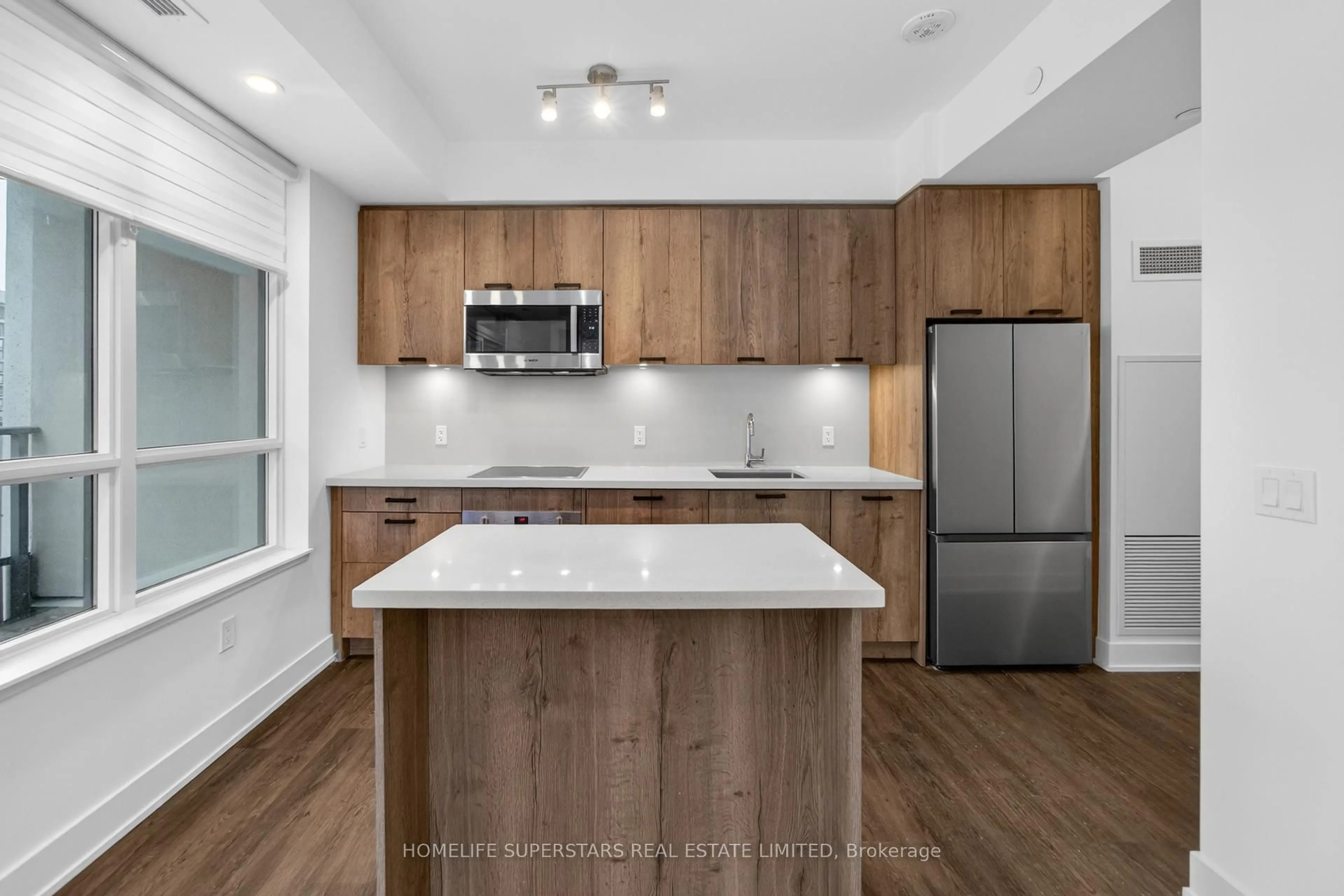 Open concept kitchen, wood/laminate floor for 2 Teagarden Crt #707, Toronto Ontario M2N 5Z9